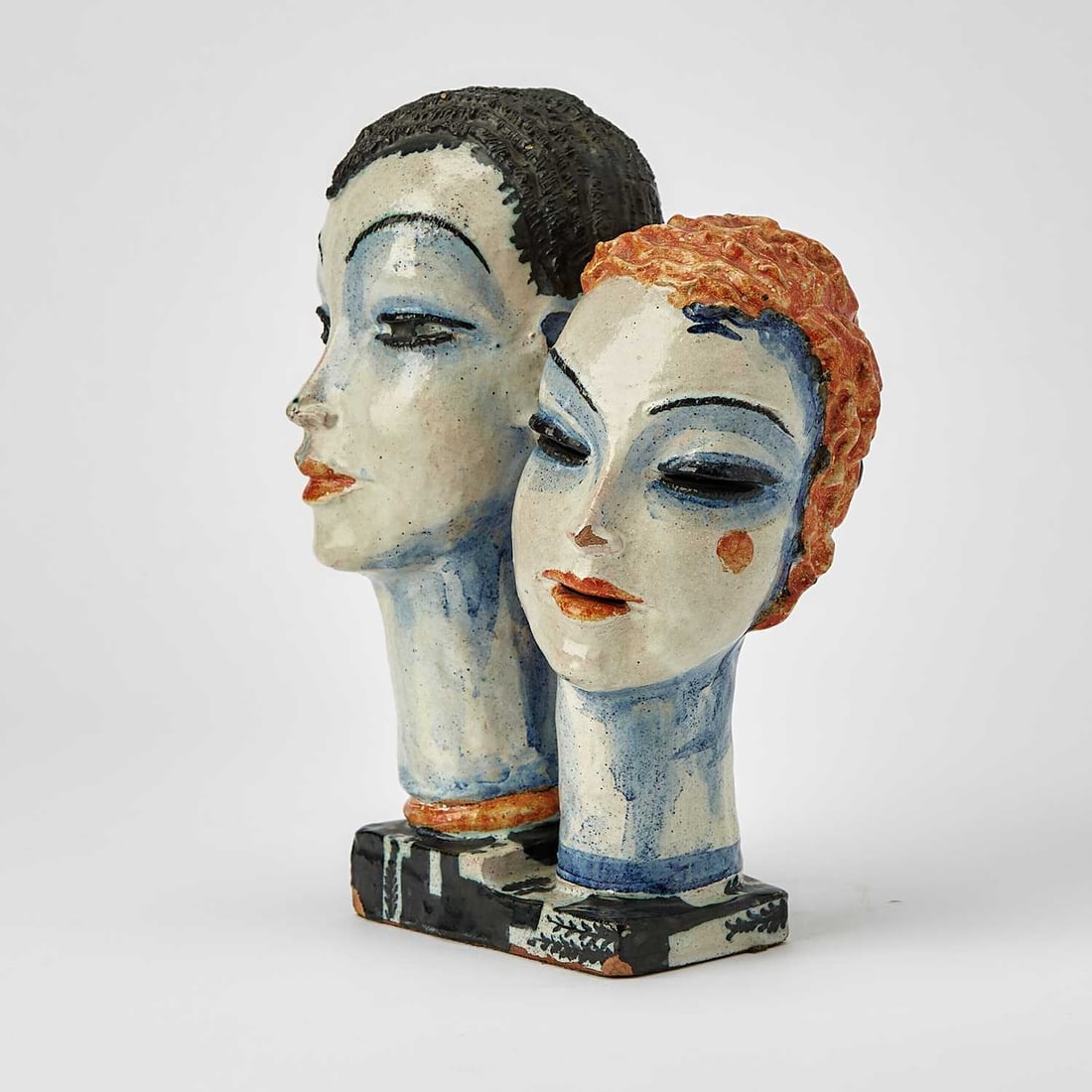 Gudrun Baudisch-Wittke: Austrian, 1907-1982 Two Heads (Double Portrait) Stamped WW Made in Austria 584 GB on the underside Painted and glazed ceramic 9 1/2 x 4 1/2 x 6 3/4 inches (24.1 x 11.4 x 17.1 cm)
