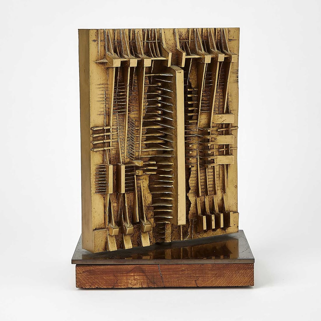 Arnaldo Pomodoro: Italian, 1926-2025 Door for Galerie Kriwin, 1977 Signed and numbered Arnaldo Pomodoro 6/30 on the base Bronze with golden patina 9 1/2 x 7 3/8 x 5 3/4 inches (24.1 x 18.7 x 14.6 cm) Literature:
