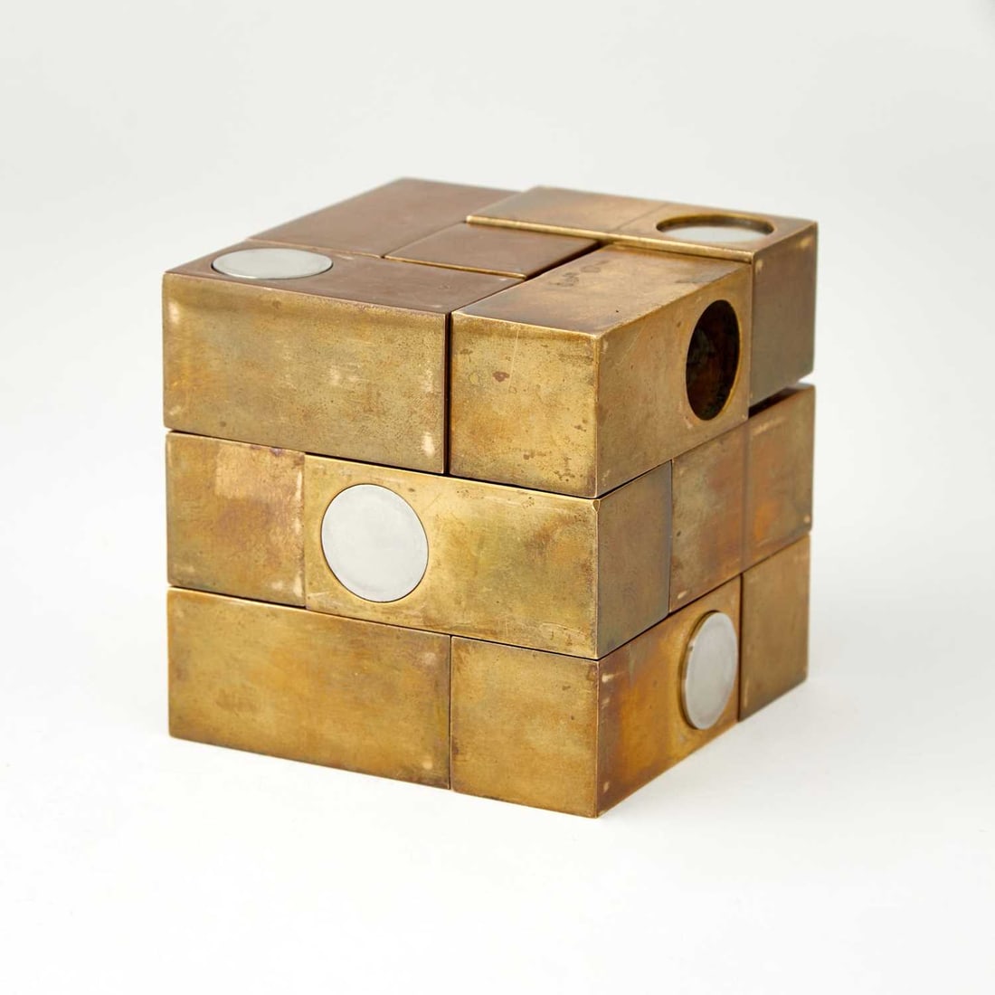Grupo Mijar: CUBO MIJAR Brass and iron multiple, 1974, incised Serie, numbered 6/200. 3 1/2 x 3 1/2 x 3 1/2 inches; 8.8 x 8.8 x 8.8 cm