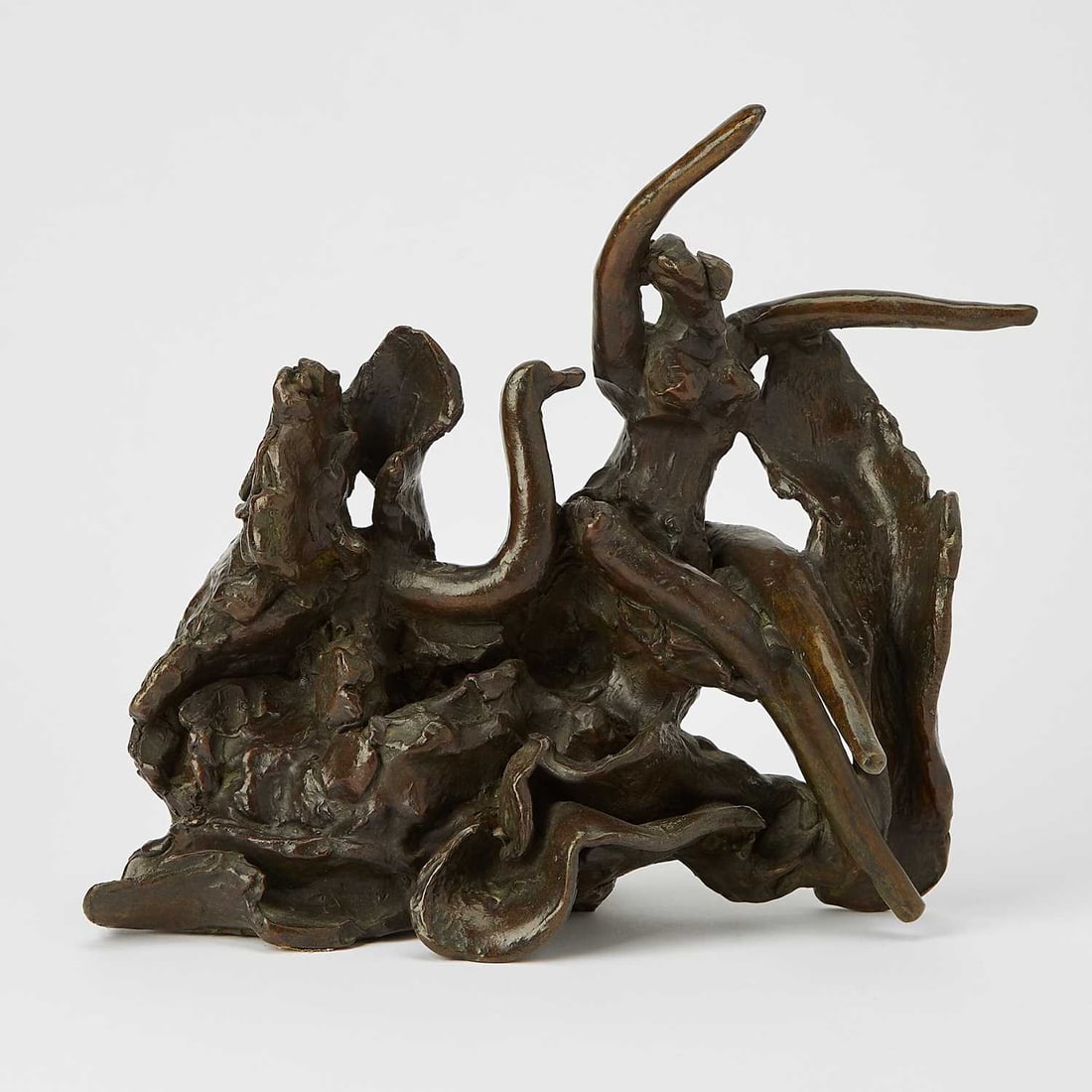 Reuben Nakian: American, 1897–1986 Leda and the Swan, 1978 Signed Nakian, dated 1978, stamped with Renaissance Art Foundry mark and numbered 7/7 on the backside Bronze with brown patina 10 3/4 x 11 x 6 inches