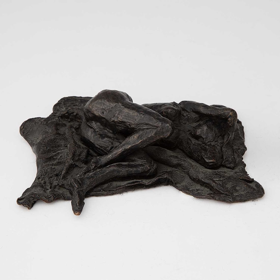 Dario Morales: Columbian, 1944-1988 Recumbent Nude Signed Morales and stamped with foundry mark Bronze with brown patina 2 x 7 1/4 x 5 1/4 inches (5.1 x 18.4 x 13.3 cm)