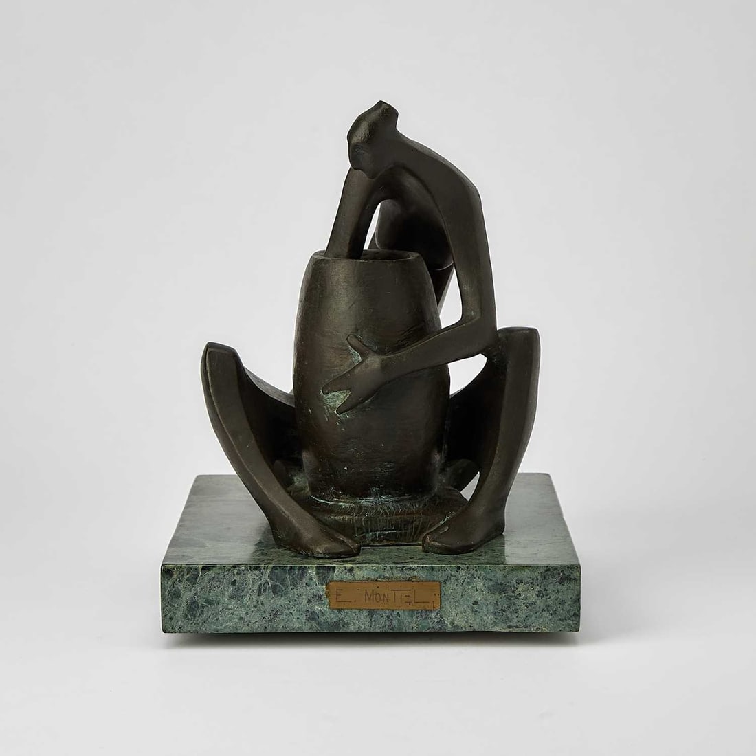 Eduardo Montiel: Mexican, 20th Century Seated Figure Signed E Montiel on the backside Bronze with brown patina 10 x 9 1/2 x 9 inches (25.4 x 24.1 x 22.9 cm)