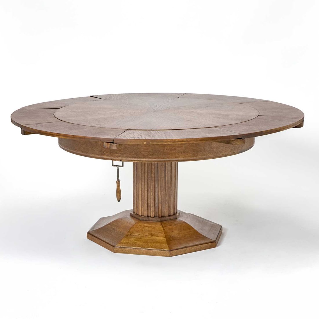 Josef Seiler Oak "Liegnitz Ringtisch" Pedestal Expanding Dining Table: 1920s Height 31 inches, diameter closed 47 1/4 inches, diameter open 67 inches.