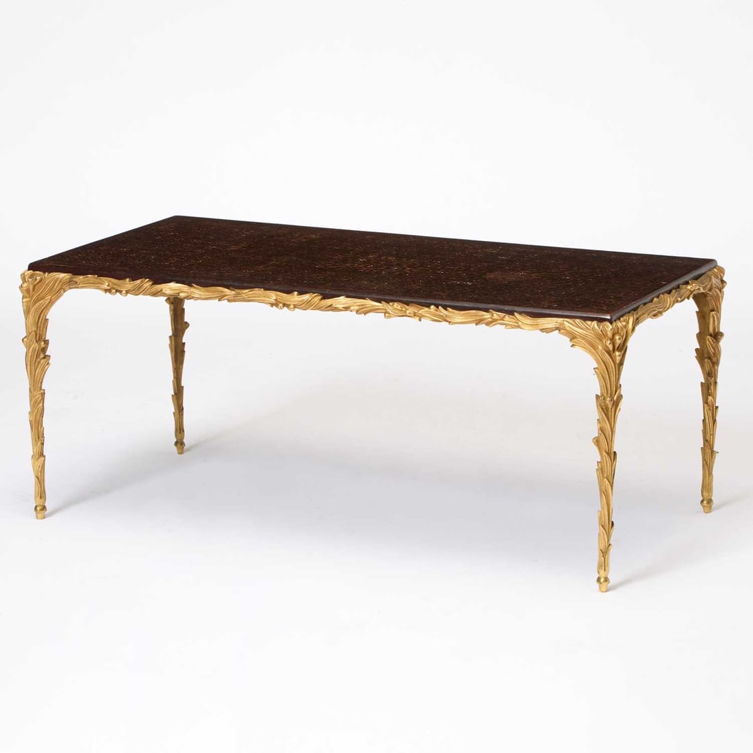 Maison Jansen Style Black Lacquer Inset Gilt Metal Coffee Table: Late 20th century Height 17 inches, width 40 1/2 inches, depth 20 3/4 inches.