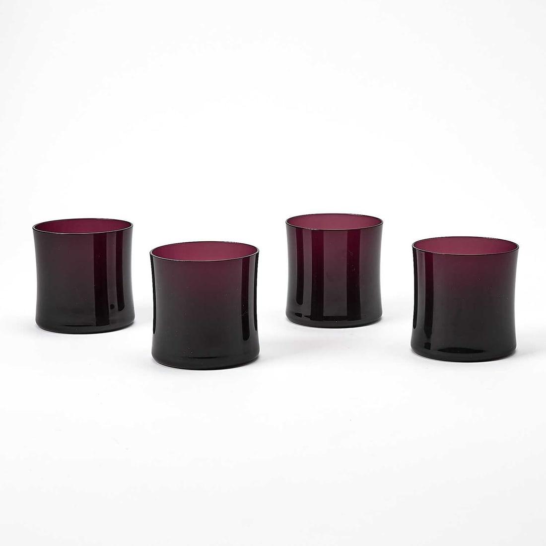 Set of Four Armani Casa Mold-Blown Glass "Nelson" Pattern Tumblers: Each in transparent dark amethyst colored glass. Height 3 inches.