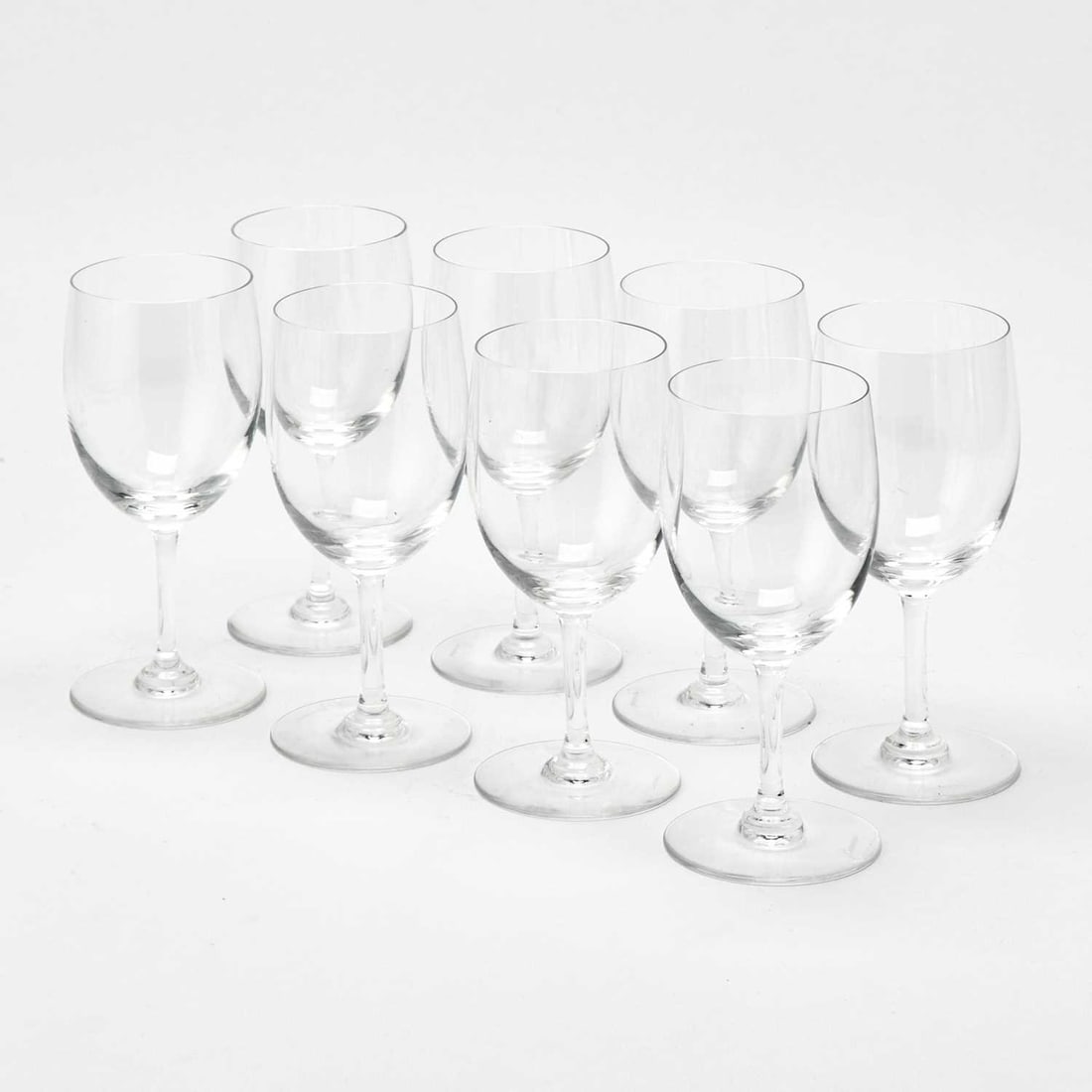 Set of Eight Baccarat Blown Glass Wine Glasses: Height 6 1/2 inches.