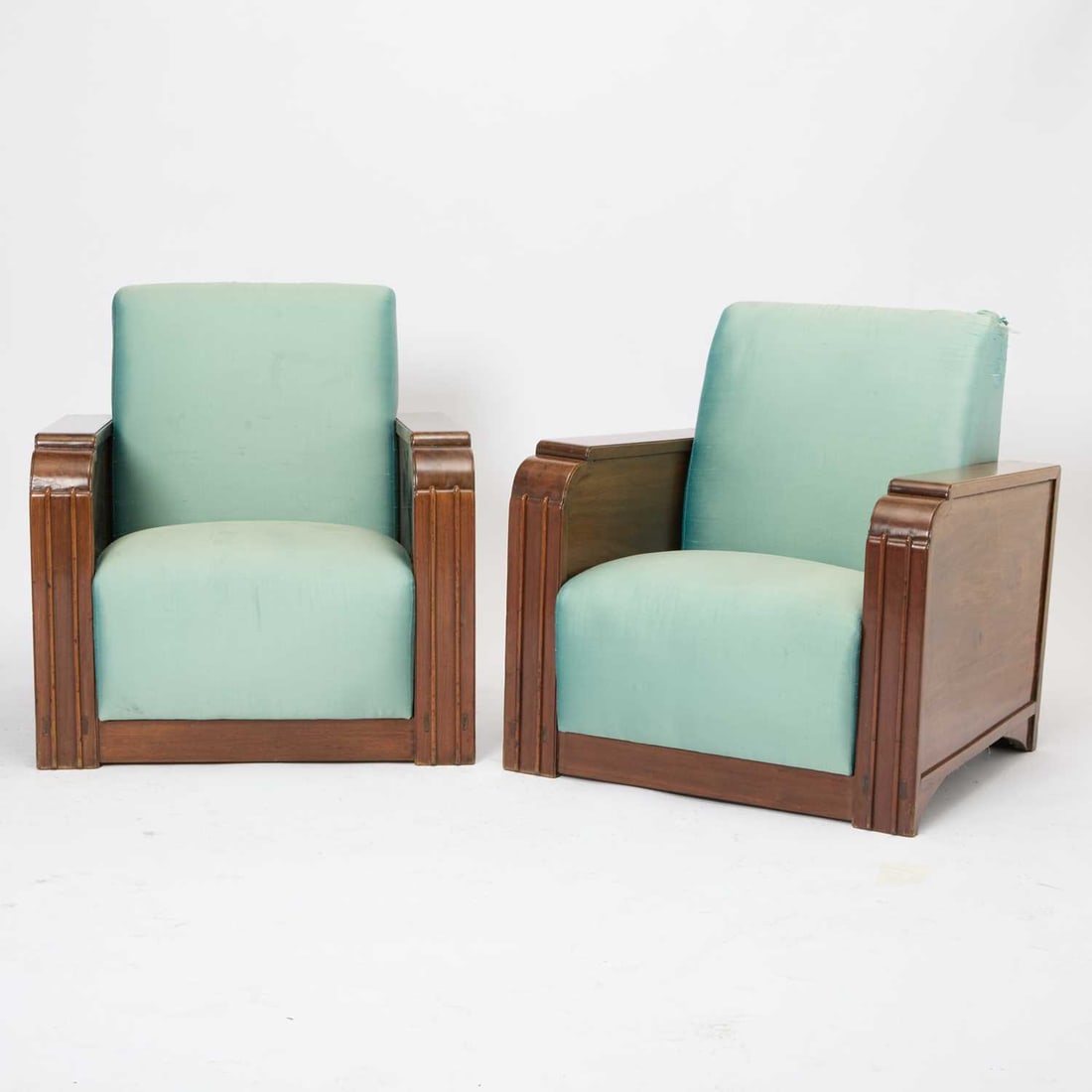 Pair of Art Deco Upholstered Walnut Club Chairs: 1930s/1940s Height of back 33 1/2 inches, height of seat 16 1/4 inches, width 33 1/4 inches, depth 29 inches.