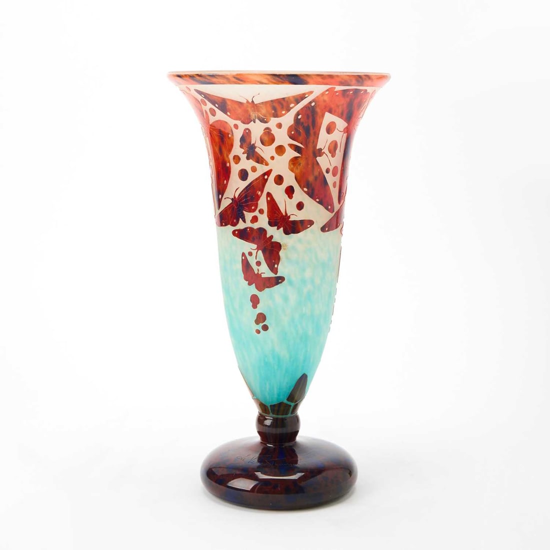 Le Verre Francais Art Deco Acid-Etched Cameo Glass “Papillons” Vase: Circa 1925-30 Of flower form, with a flared mouth and pied souffle, in red, cobalt blue, turquoise blue, plum, and colorless glass, decorated with stylized butterflies in flight, engraved on the foot 
