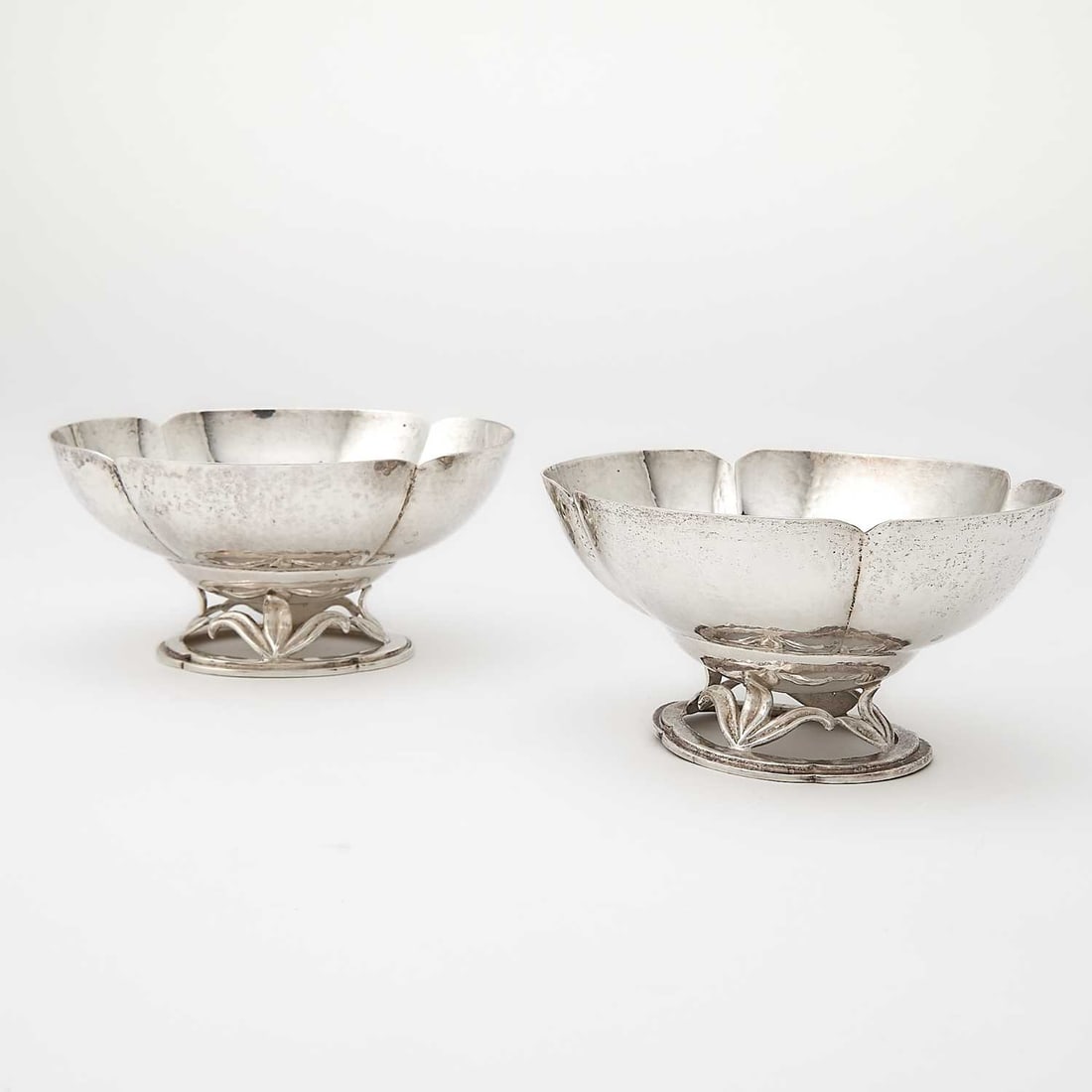 Pair of Randahl Sterling Silver Footed Bowls: Second quarter 20th century Height 3 inches, length 5 1/2 inches, total approximately 13 ounces.