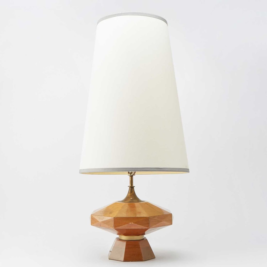 Arturo Pano (Mexican, 1915-1981) Mahogany Table Lamp: Circa 1955 Height overall 33 3/4 inches; height of body 7 3/4 inches, width 11 1/2 inches; height of 21 1/2 shade, bottom diameter 15 inches. Provenance: Daniel Liebsohn Gallery, Mexico City.