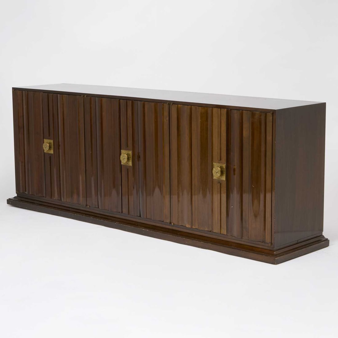 Tommi Parzinger Walnut Sideboard: 1960s Height 34 1/2 inches, length 8 feet, depth 21 1/2 inches.