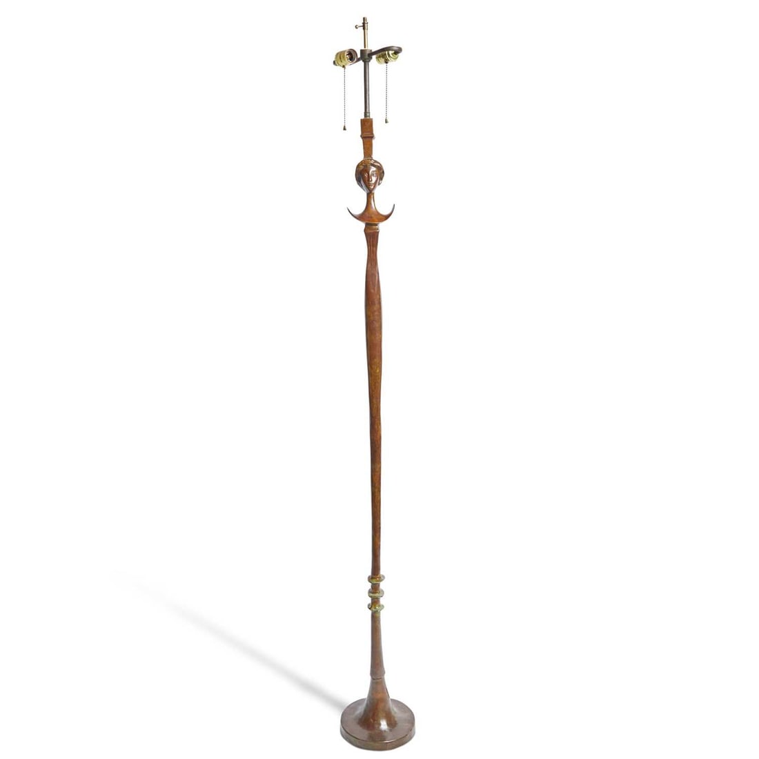 After Albert Giacometti Patinated Bronze "Tête de Femme" Model Floor Lamp: Designed circa 1933-34, this example late 20th century Unmarked. Height 61 1/2 inches.