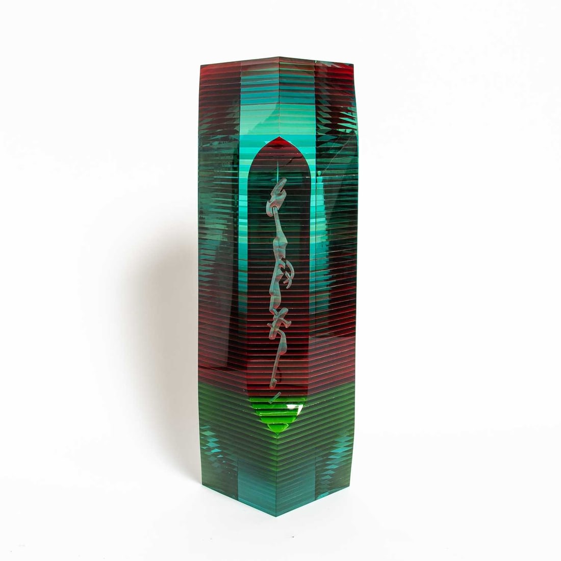Bohumil Eliáš Jr. Cut, Polished and Laminated Glass Tower-Form Sculpture: 1999 Signed and dated, height 31 1/4 inches, 8 inches square; Together with a White Laminate Pedestal. Height of pedestal 32 3/4 inches, width 14 inches.