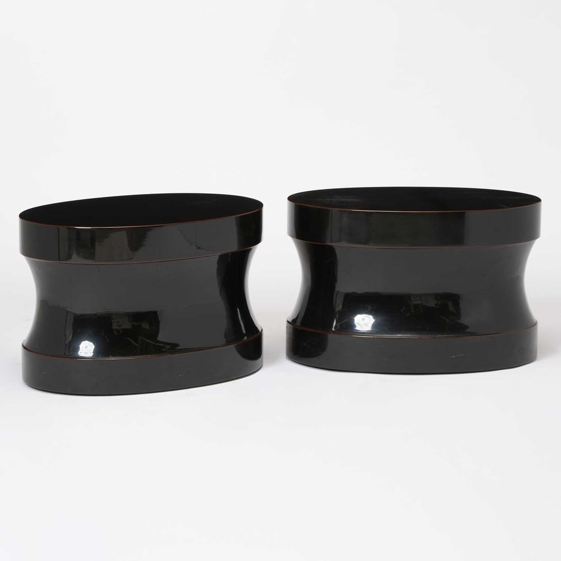 Pair of Christian Liaigre Black Lacquered Wood "Flibuste" Coffee Tables: Designed 1997 Height 15 inches, width 24 inches, depth 16 1/4 inches.