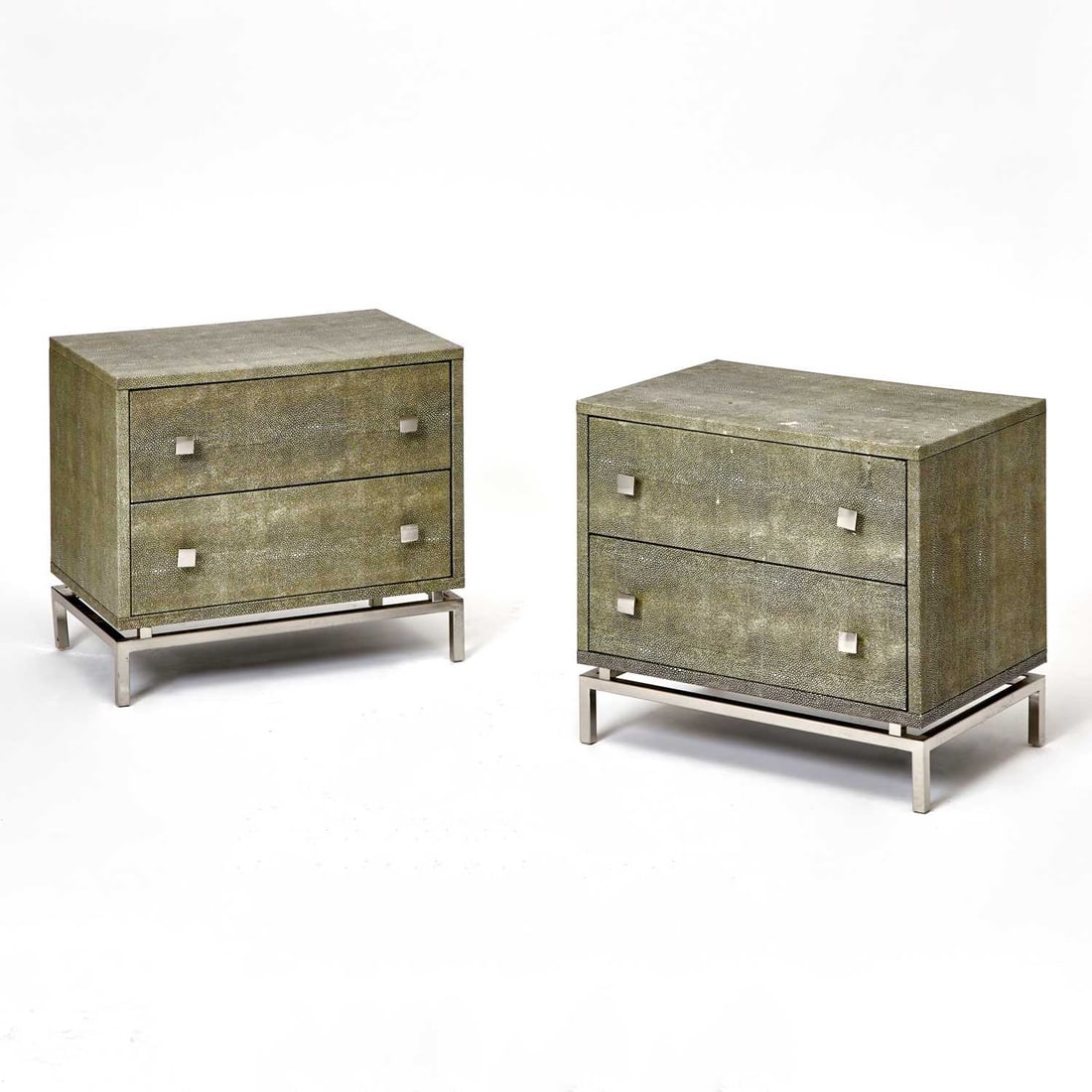 Pair of Faux Shagreen Bedside Chests of Drawers: Late 20th century Height 21 1/2 inches, width 23 1/4 inches, depth 16 inches.
