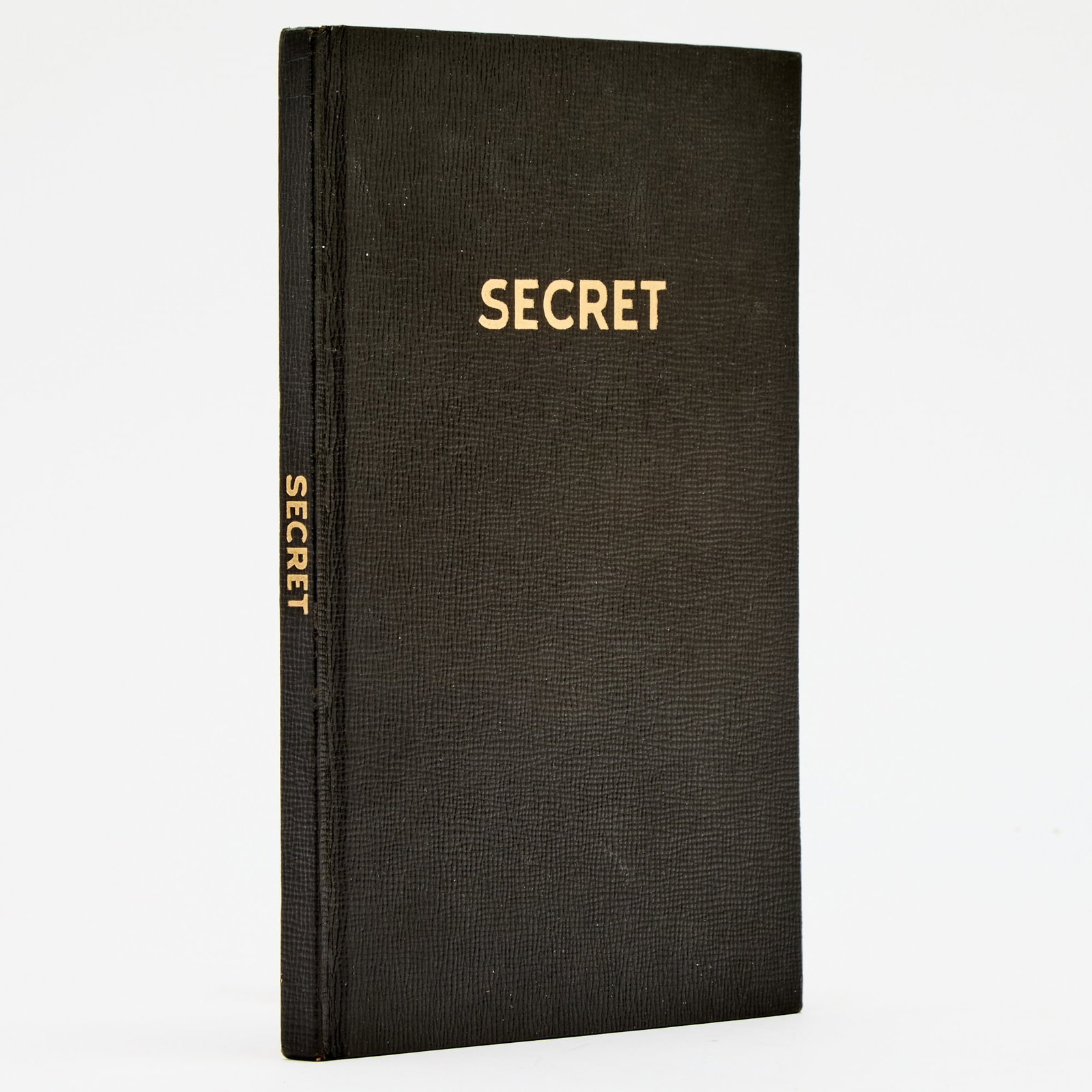 The navigator of the Enola Gay comments on the dropping of the atomic bomb: [WORLD WAR II - ENOLA GAY] [VAN KIRK, THEODORE, navigator]. STOUT, WESLEY W. Secret*. Detroit: Chrysler Corporation, 1947. First edition, with two long manuscript notes on the front blank signed as "T