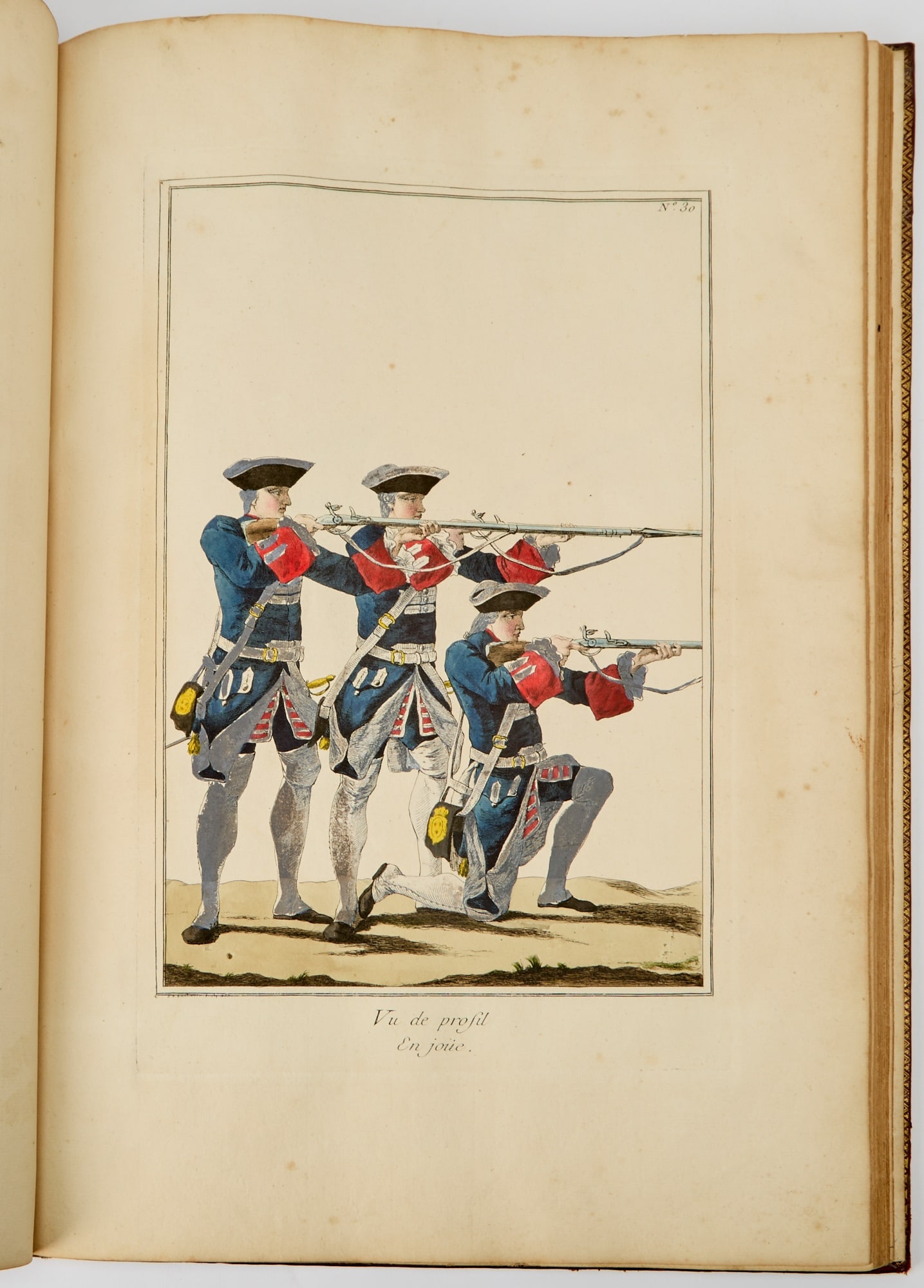 A colored copy of Baudoin's Exercise de l'Infanterie Francoise: BAUDOUIN, SIMON-RENE, COMTE DE Exercise de l'Infanterie Francoise. [Paris]: 1757. Contemporary French red morocco, covers with a gilt-roll border, spine in eight compartments, titled in the second, ot