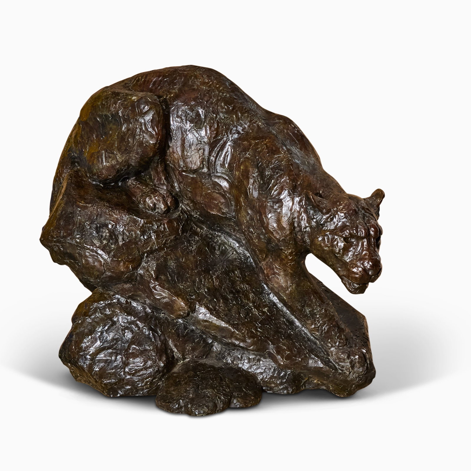 Kenneth Rodney Bunn: American, b. 1938 Crouching Cougar, 1986 Signed, dated, inscribed with copyright symbol and numbered 6/6 Bronze with a brown patina, on a granite base Height of bronze 47 inches (119.4 cm) Please