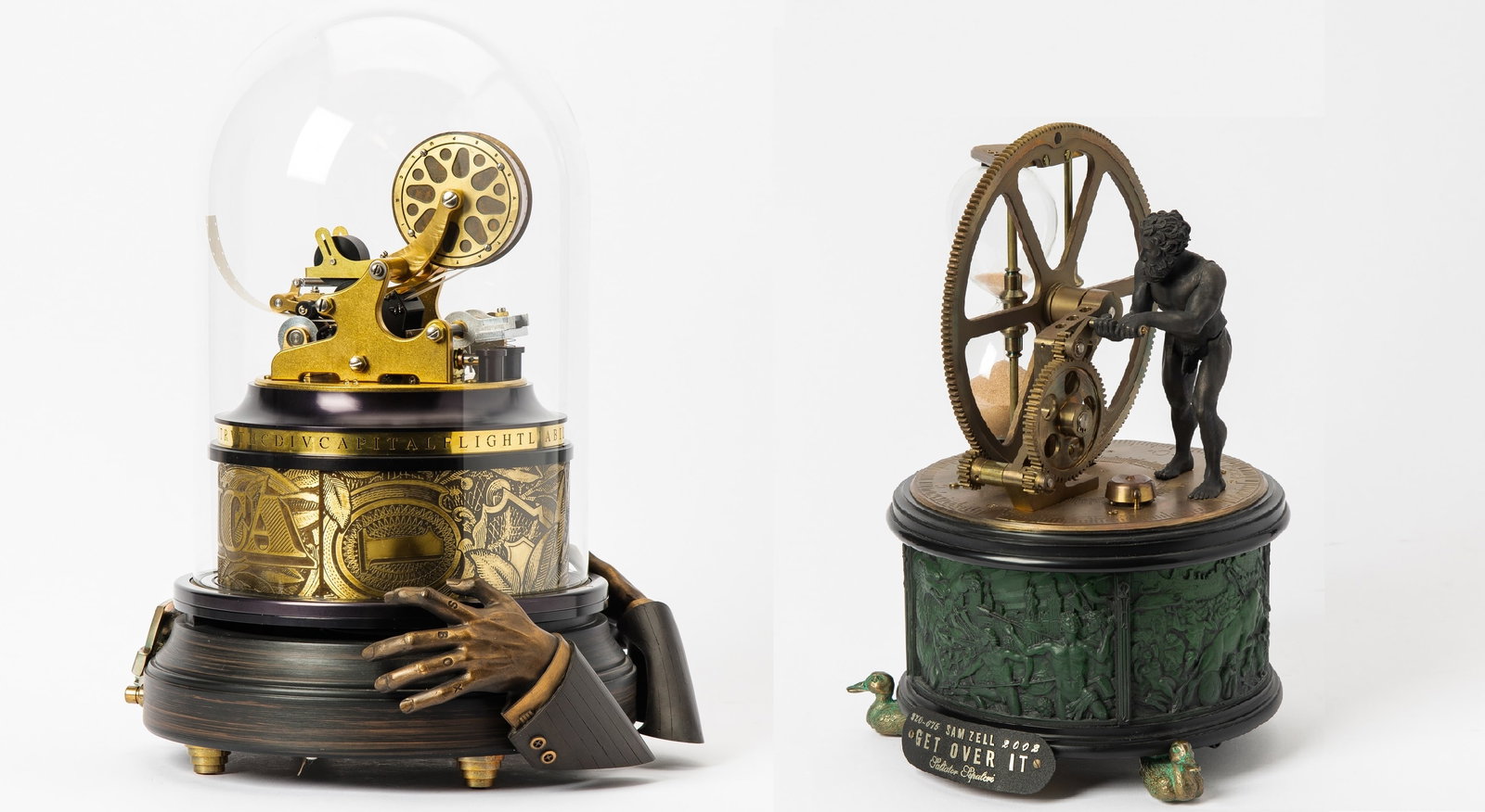 Sam Zell: American, 1941-2023 (i) Sarbox (Automaton), 2006 Number 300 from the edition of 675 Brass, metal, molded plastic, paper 15 1/2 x 10 5/8 x 11 3/4 inches (39 x 27 x 30 cm) (ii) Get Over It (Automaton),