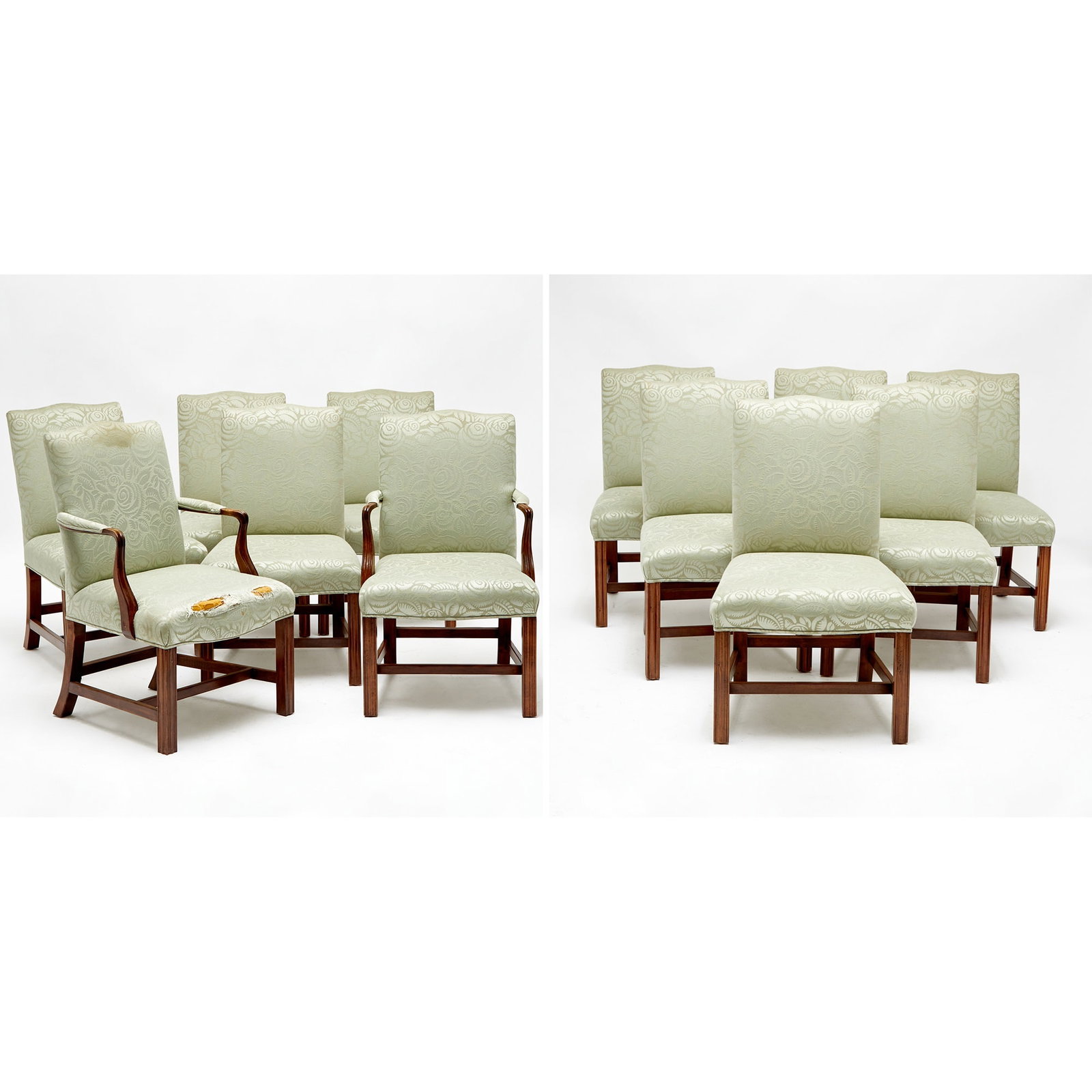 Set of Twelve George III Style Upholstered Beechwood Dining Chairs: Late 20th century Comprising two armchairs and ten side chairs. Height 39 inches, width 24 inches, depth 20 inches. torn and stained fabric