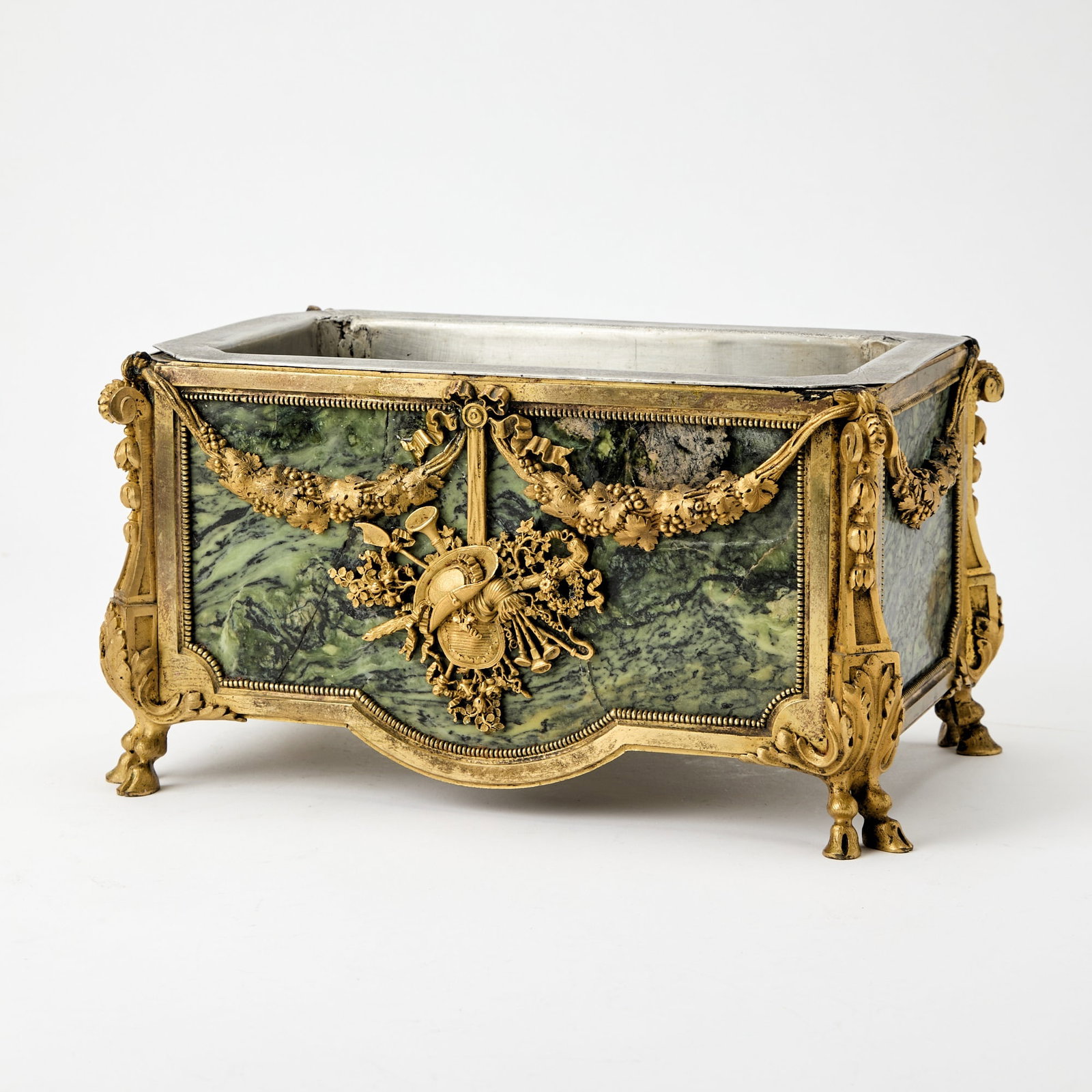 Louis XVI Style Gilt-Bronze Mounted Green Marble Jardinière: Late 19th century Height 6 inches, width 11 inches, depth 7 inches. one marble panel repaired