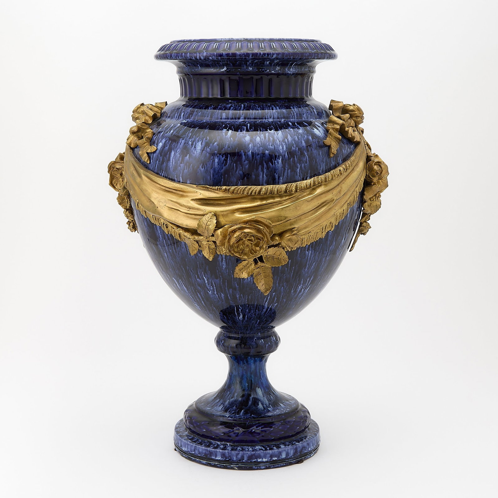 Large Louis XVI Style Gilt Bronze Mounted Blue Flambe Ceramic Vase: Early 20th century Height 19 inches, diameter 12 inches.