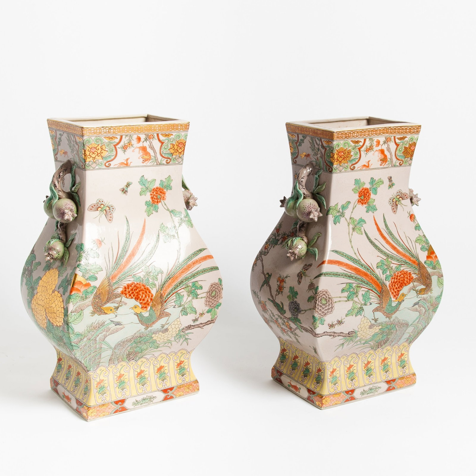 Pair of Chinese Enameled Porcelain Square Vases 20th Century: Of arrow-vase form; decorated with blossoming branches and butterflies. (Height 24 1/2 inches)