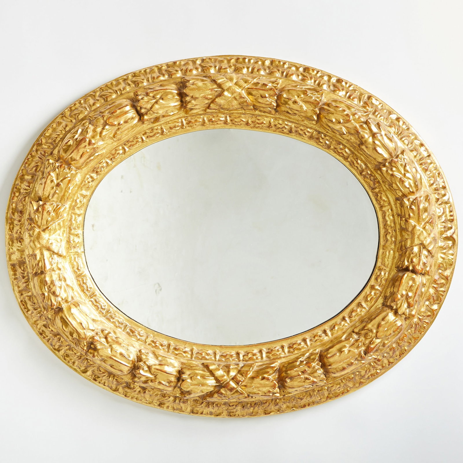 Giltwood and Composition Oval Mirror: Height 24 inches, width 32 inches.