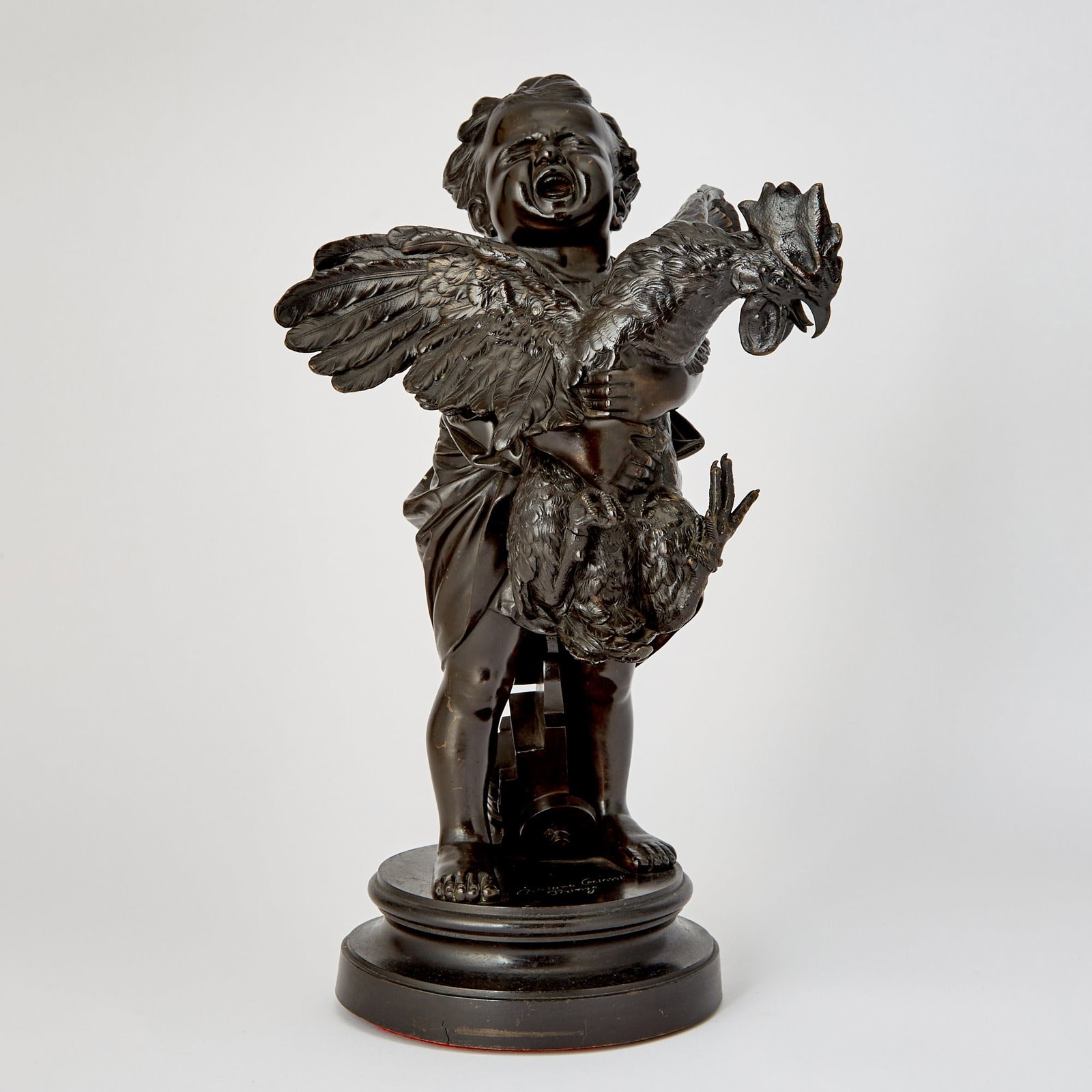 Adriano Cecioni, Patinated Bronze Sculpture Titled "Bambino con Gallo": Adriano Cecioni, (1838-1886) Young boy with a rooster, Inscribed "Adriano Cecioni Firenze" and stamped "107" Height 18 inches.