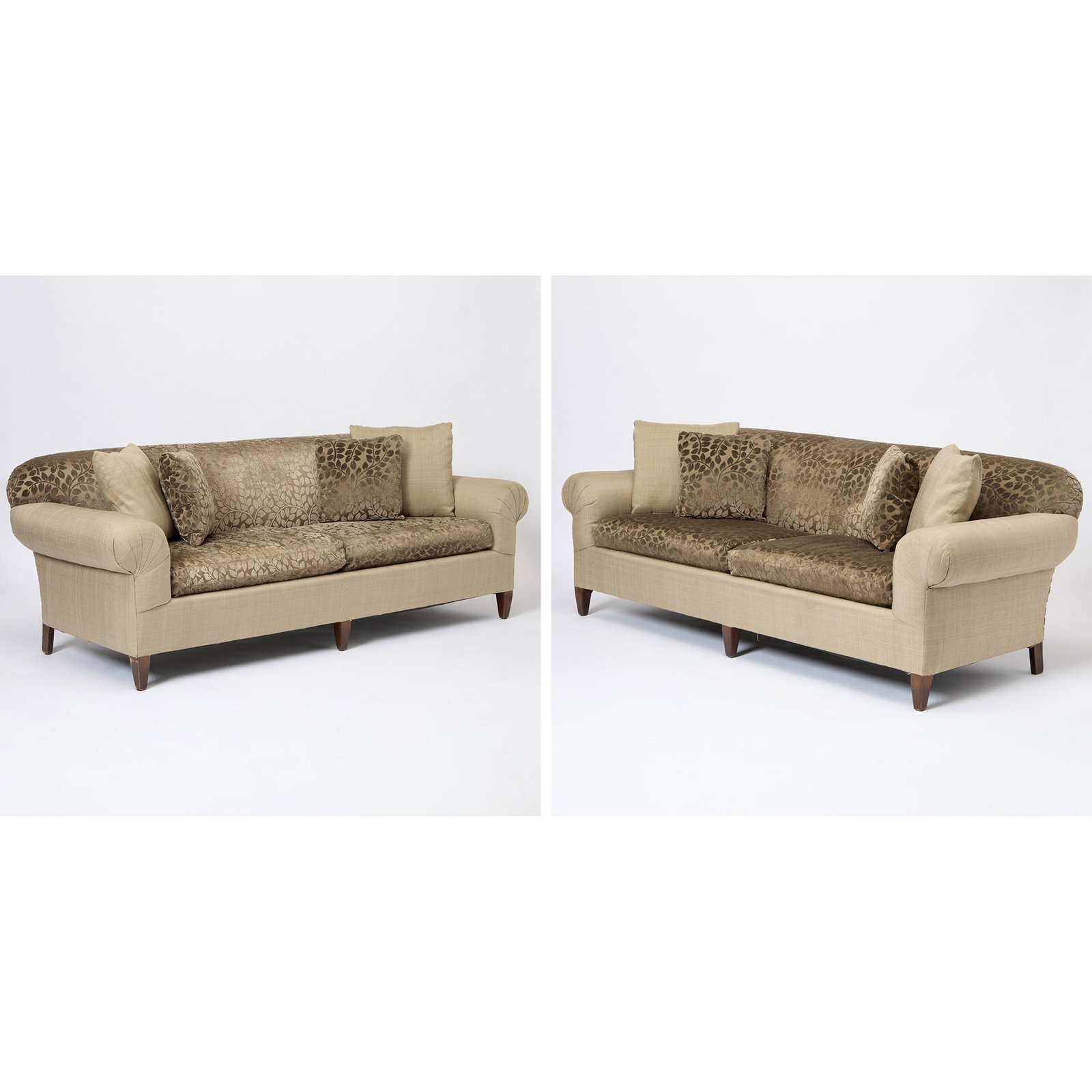 Pair of Upholstered Mahogany Sofas: Together with eight throw pillows. Height 30 inches, width 7 feet, depth overall 36 inches, depth of seat 21 inches, height of seat 18 inches.