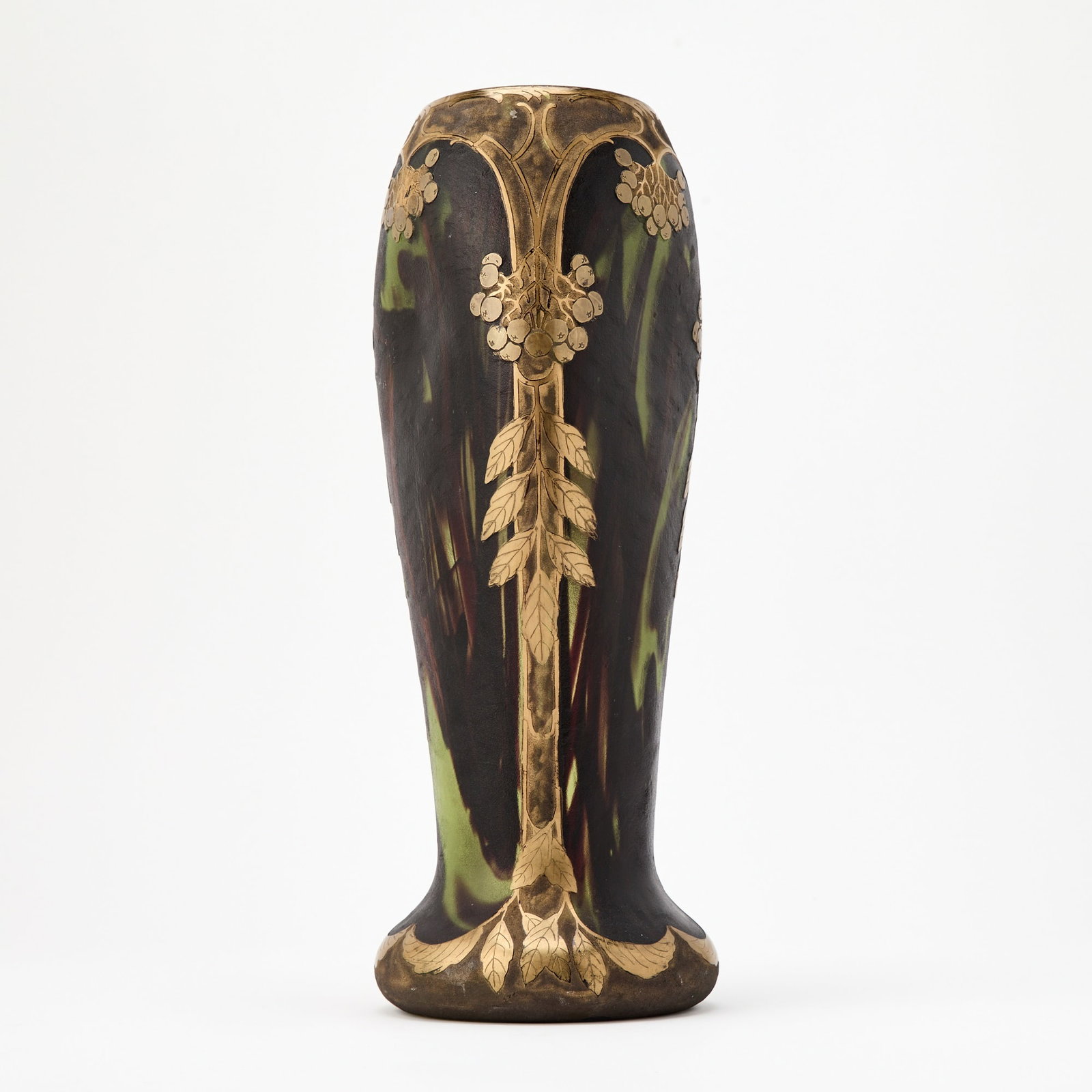 Legras et Cie. Art Nouveau Blown, Acid-Etched and Gilt Decorated Glass Vase: Circa 1915 Of flower form with three flattened sides, in mottled and striated translucent green and opaque plum colored glass, decorated with stylized leaves, stems and berry clusters, stamped in