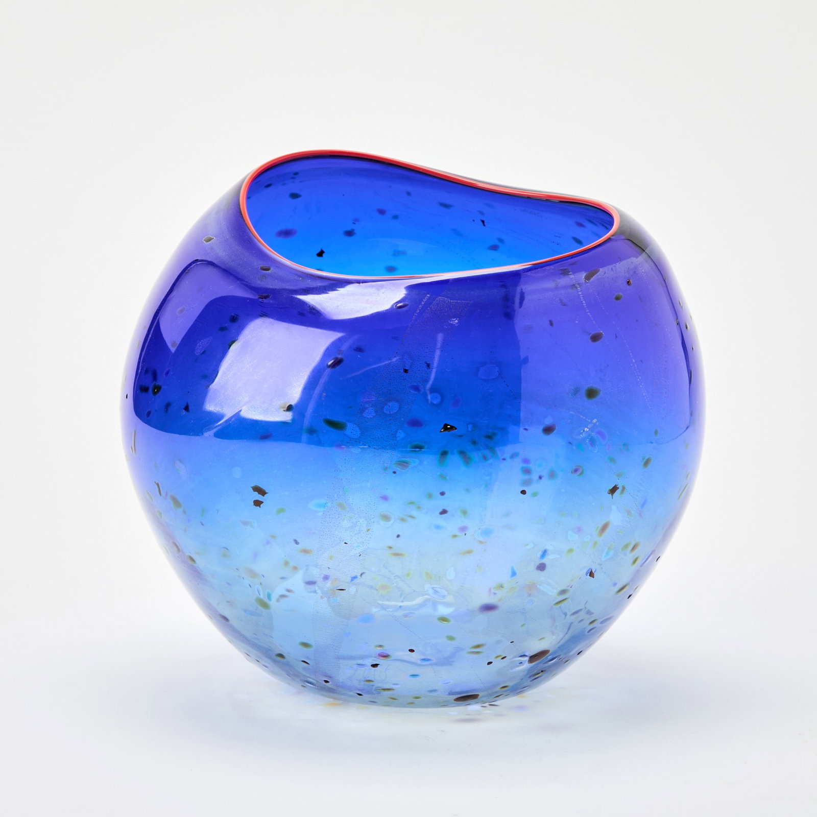 Dale Chihuly Hand-Blown Glass Cobalt Blue Basket With “Confetti” and Cadmium Red Lip: Portland Press Edition, 1994 Of organic form, engraved Chihuly and PP94. Height 7 7/8 inches, width 8 1/2 inches. appears to be in very good, undamaged condition; no condition issues were ob