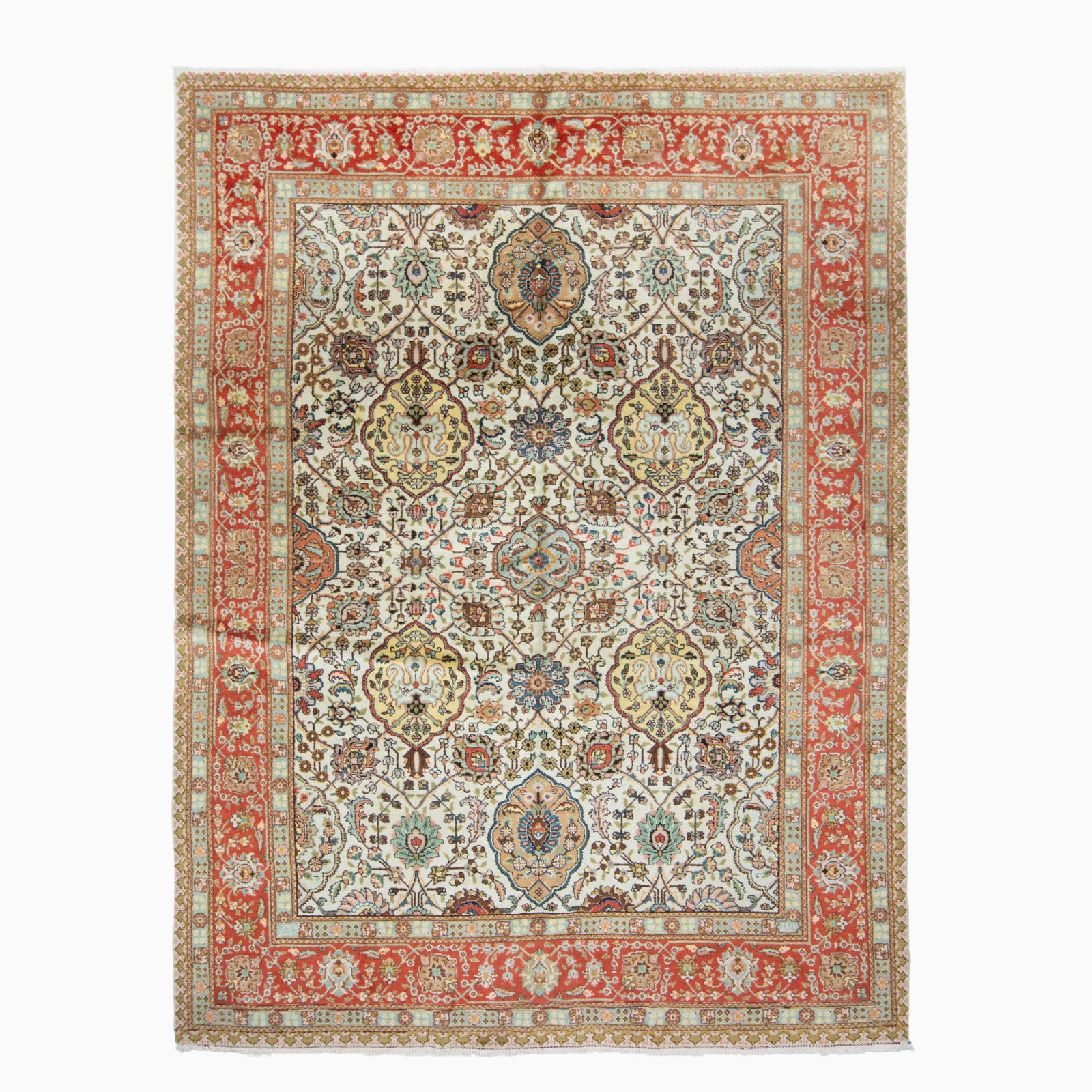 Tabriz Carpet: Northwest Iran, Mid-20th Century The ivory field with an overall pattern of large-scale flora in a vinery lattice is within a madder palmette and meandering vine border. Signed. (10' 7" x 7' 9")