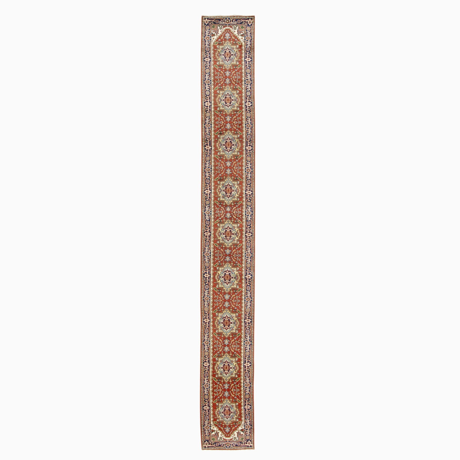Indo Heriz Runner: India, Contemporary Nine geometric medallions on the madder field are within an indigo palmette and vine border. (20' 1" x 2' 7")