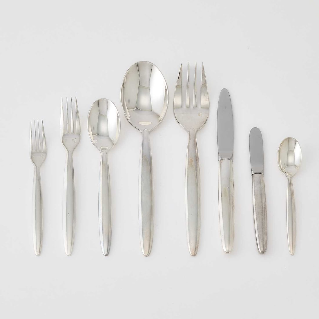 Christofle Silver Plated "Orleans" Pattern Part Flatware Service: Late 20th century Comprising: Six dinner forks Six salad forks Six dinner knives Six dessert spoons Six teaspoons Master butter knife Serving fork Serving spoon (33) Good condi