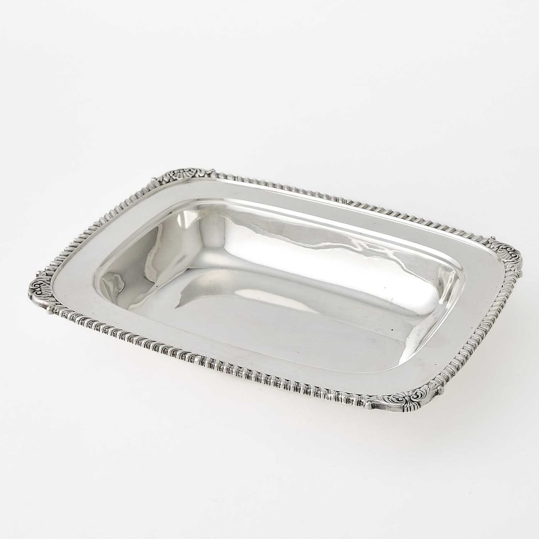 Tiffany & Co. Sterling Silver Open Vegetable Dish: 1907-1938 Rectangular with shell and gadrooned border. Height 1 3/4 inches, length 11 inches, approximately 22 ounces.