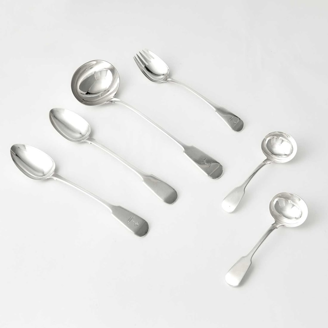 Group of Georgian/Victorian Sterling Silver Serving Pieces: 19th Century Comprising: Victorian soup ladle marked William Eaton, London, 1840, length 14 inches Victorian gravy ladle marked Thomas Smily, London, 1868, length 6 3/4 inches George IV gravy ladle ma
