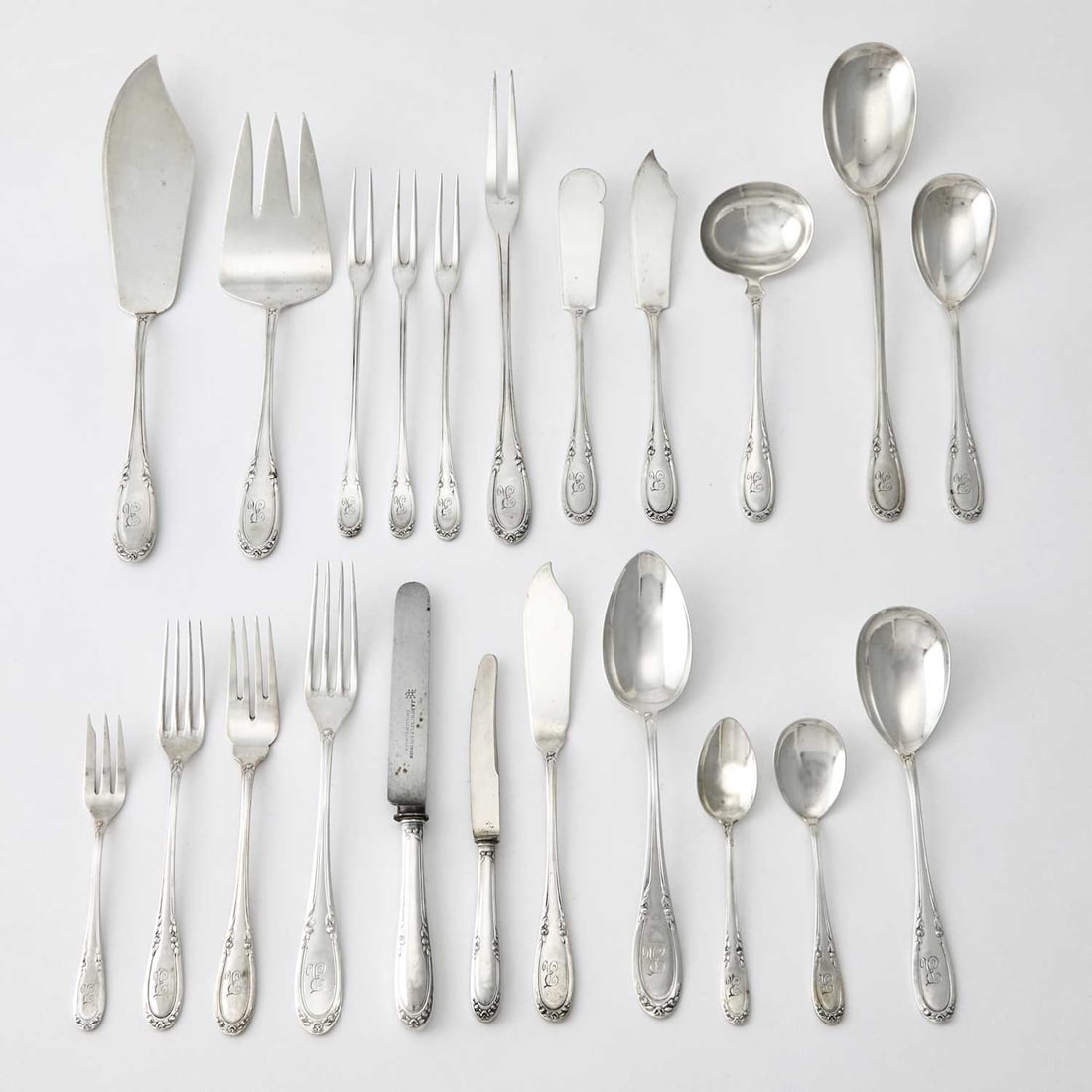 Continental Silver Flatware Service: Comprising: Twelve dinner forks Twelve lunch forks Eleven fish forks Twelve cocktail forks Twelve lunch knives Twelve fish knives Eight fruit knives Twelve tablespoons Twelve sorbet spoons Five te