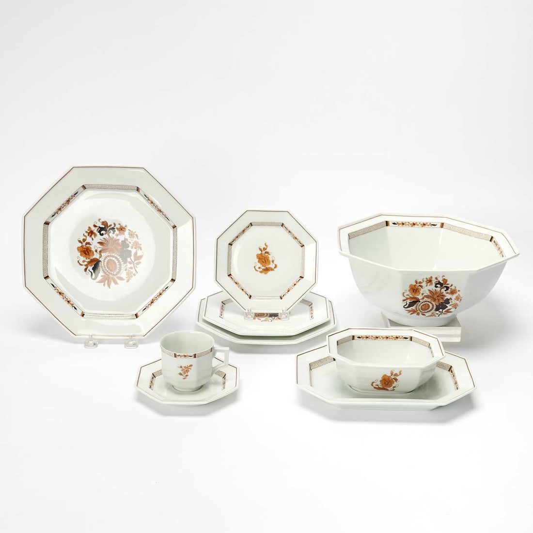 Assembled Jean Louis Coquet for Limoges Porcelain Partial Dinner Service: In the Lotus/Ambassade pattern, each article of octagonal form, comprising: Sixteen dinner plates, width 9 3/4 inches Sixteen salad plates, width