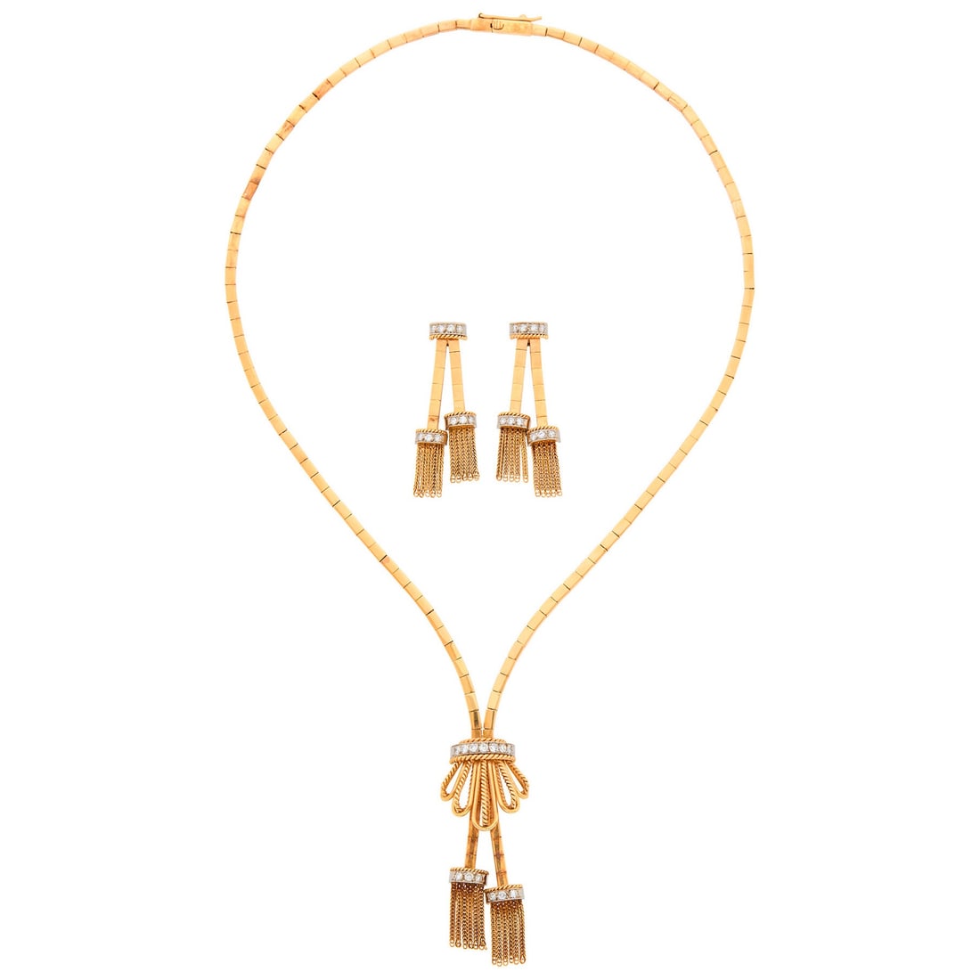 Two-Color Gold and Diamomd Tassel Necklace and Pair of Earrings: 18 kt. yellow and white gold, 33 transitional and single-cut diamonds ap. .70 ct., c. 1940, ap. 35 dwts. Length 16 1/2 inches. Diamonds: H-I-VS-SI. Minor bend to necklace link towards back near clasp,