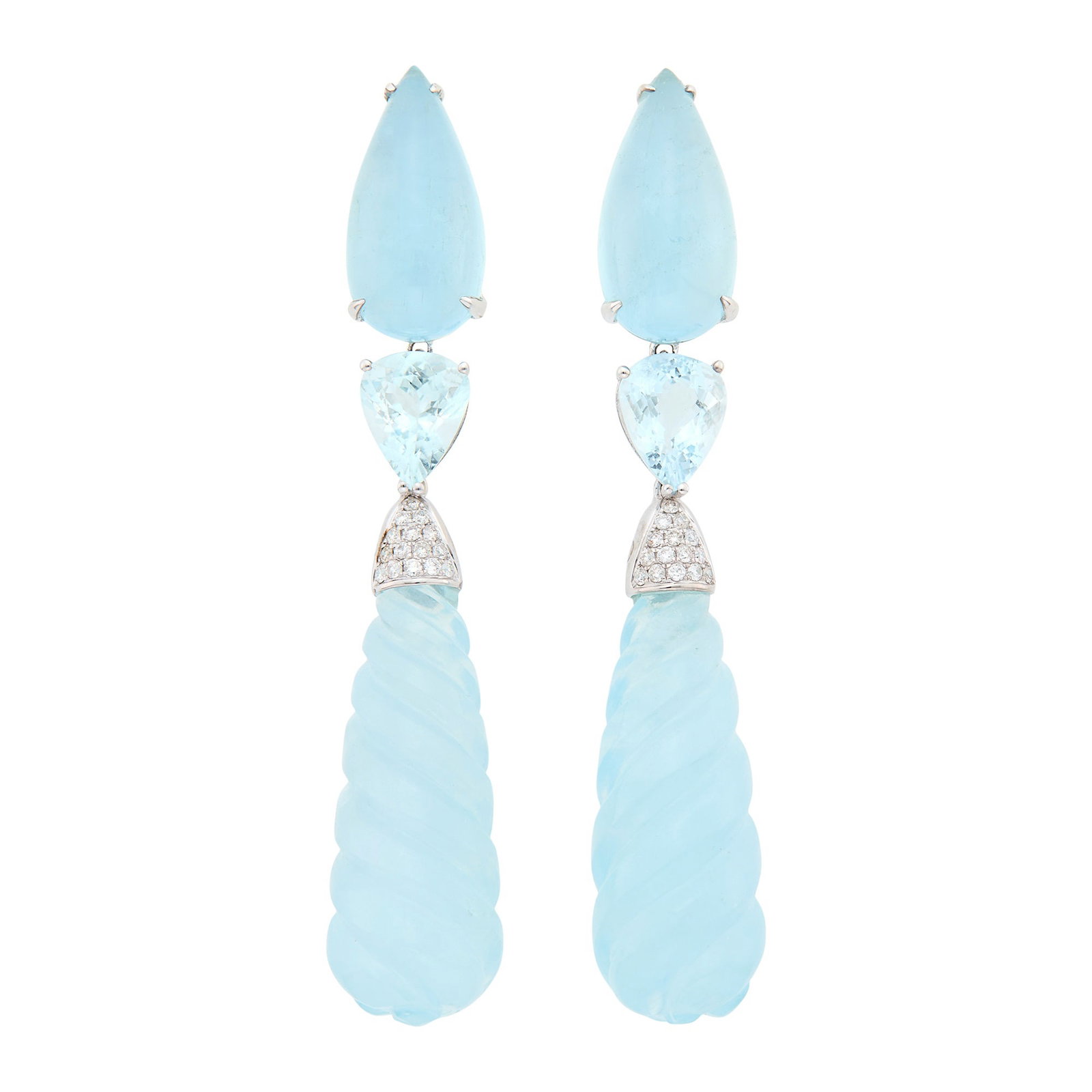Pair of White Gold, Aquamarine and Diamond Pendant-Earclips: 18 kt., 2 pear-shaped cabochon aquamarines ap. 17.00 cts. 2 pear-shaped aquamarines ap. 4.00 cts., 2 fluted drop-shaped aquamarines ap. 31.0 x 12.0 x 12.5 mm., small round diamonds ap. .30 ct. Carved 