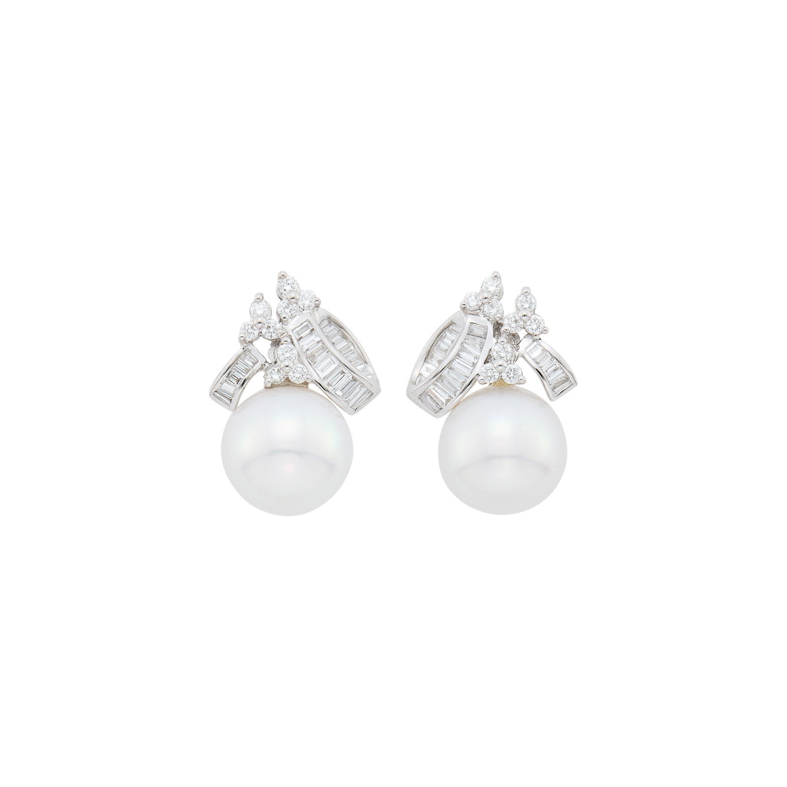 Pair of White Gold, South Sea Cultured Pearl and Diamond Earrings: 18 kt., 2 pearls ap. 12.6 and 12.3 mm., 18 round and 36 baguette diamonds ap. 1.25 cts. Pearls: white with strong rose overtone, rose and green orient, faint dimple, overall cleanish, very good luster