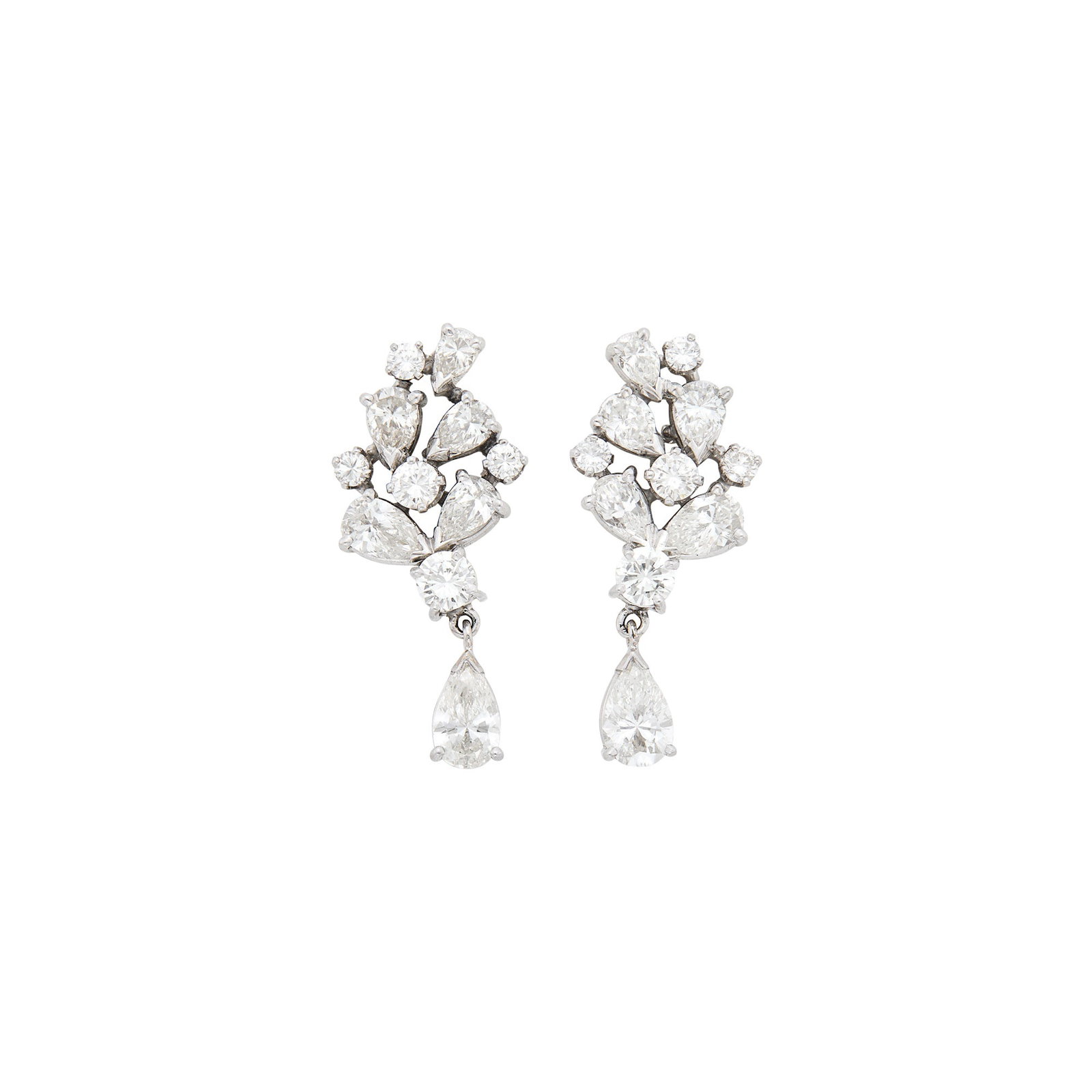 Pair of Platinum and Diamond Pendant-Earrings: 10 round and 10 pear-shaped diamonds ap. 3.60 cts., 2 pear-shaped diamonds ap. 1.00 ct., ap. 6.6 dwts. Diamonds: I-J-VS, one small round diamond with small chip at edge by prong. Posts and clip-backs.