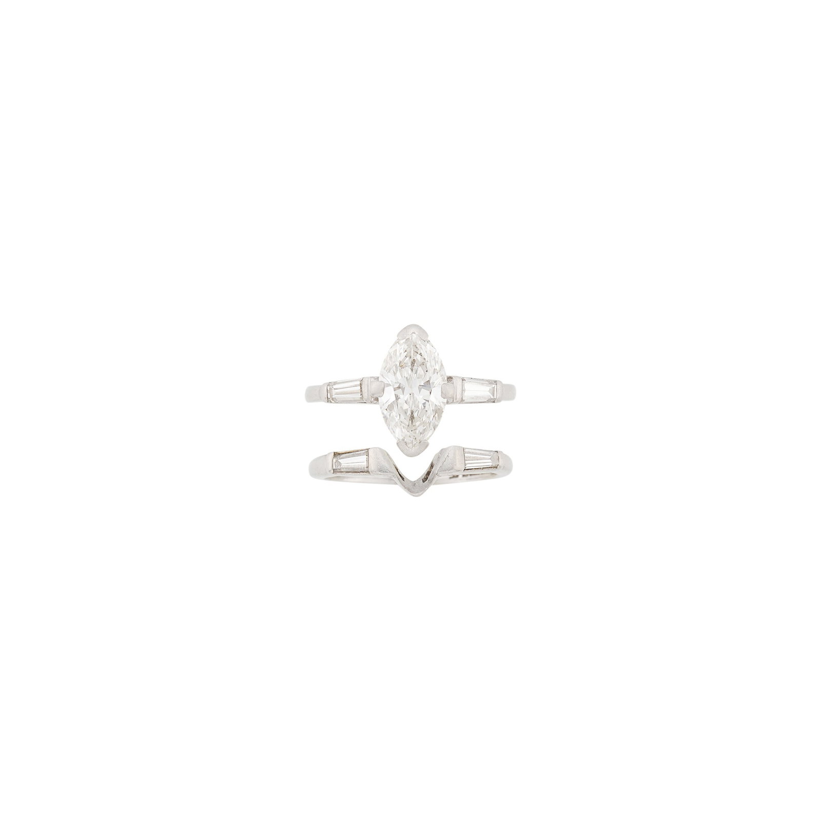 Platinum and Diamond Ring and Insert Ring: One marquise-shaped diamond weighing 1.84 cts., 4 tapered baguette diamonds. Sizes 5 1/2 and 6. With GIA report no. 2233966669 stating I color, VS2 clarity. Diamond: I-VS2, no fluorescence, nice