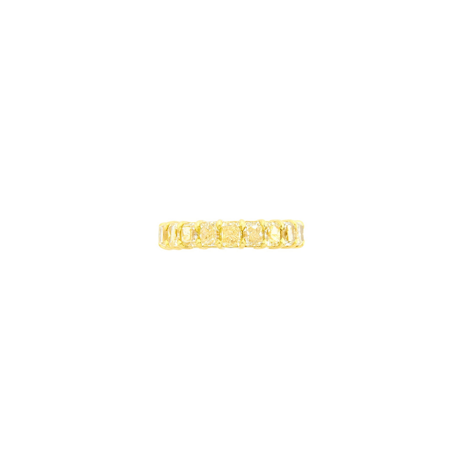 Gold and Fancy Colored Yellow Diamond Band Ring: 20 cut-cornered square modified brilliant Fancy Yellow diamonds ap. 7.00 cts. Size 6 1/2. With GIA report no. 1232953102 stating one diamond tested, .36 ct., Fancy Yellow, natural color, VS1 clarity.