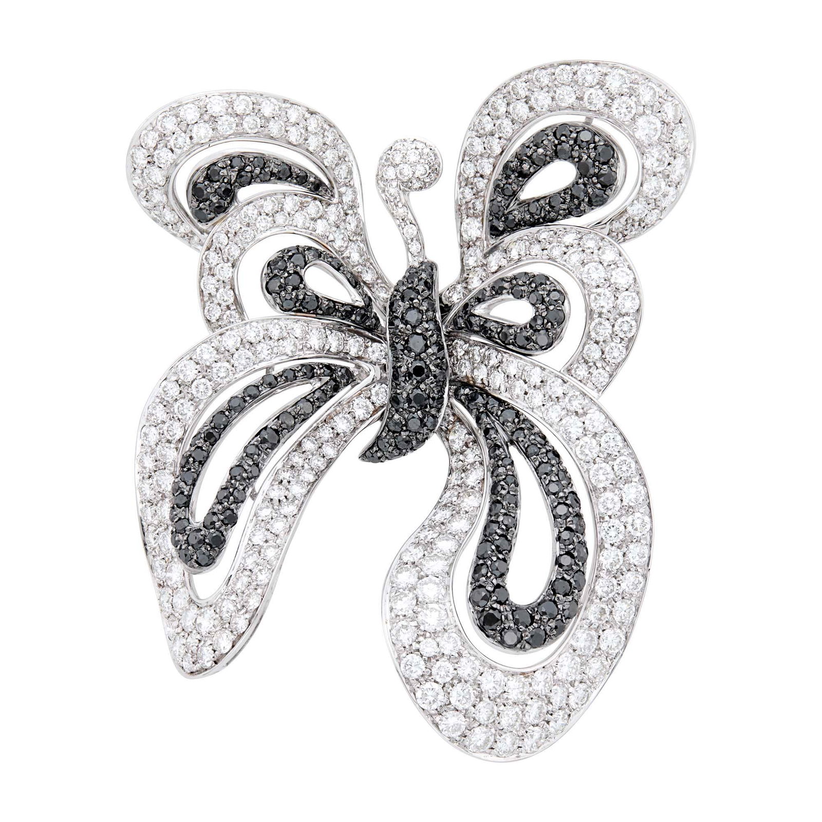 Ambrosi White Gold, Diamond and Black Diamond Bow Clip-Brooch: 18 kt., 263 round diamonds ap. 8.85 cts., 176 round black diamonds ap. 3.50 cts., signed Ambrosi, with Italian marks, ap. 20.5 dwts. Diamonds: H-I-VS. 2 5/8 x 1 7/8 inches.