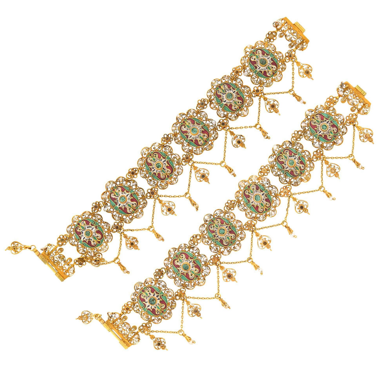 Pair of Indian Gold, Enamel, Cabochon Emerald and Seed Pearl Swag Fringe Bracelets: White, red, green and black enamel, 12 round cabochon emeralds, small seed pearls, ap. 41.7 dwts. Lengths 7 inches. Test as 18 kt. Link widths 1 1/16 inches.