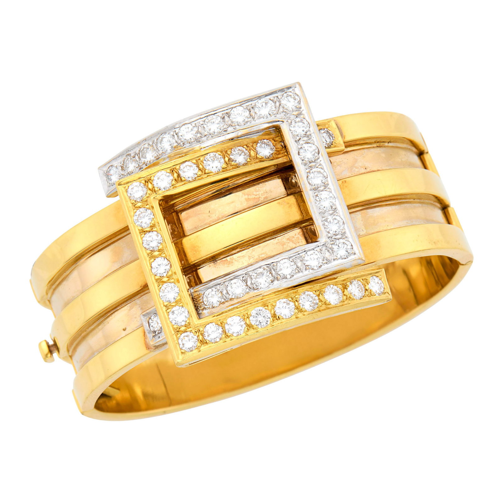 Two-Color Gold and Diamond Buckle Cuff Bangle Bracelet: Yellow and white gold, 41 round diamonds ap. 4.00 cts., ap. 49.4 dwts. Inner cir. 6 1/4 inches. Tests as 18 kt. Diamonds: H-I-VS. Width of buckle 1 3/8 inches. Bangle width 7/8 inch.