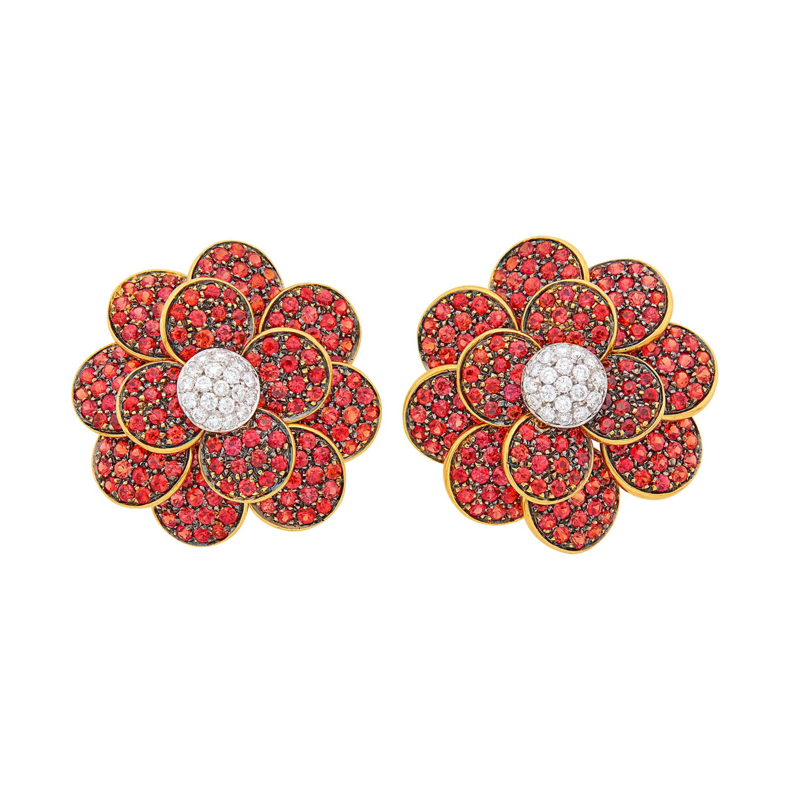 Pair of Tricolor Gold, Orange Garnet and Diamond Flower Earclips: 18 kt. yellow, blackened and white gold, round orange garnets ap. 10.00 cts., 38 round diamonds ap. .60 ct., ap. 20 dwts. Orange garnets: vivid reddish orange, cleanish, lively. Diamonds: H-I-VS-SI. C
