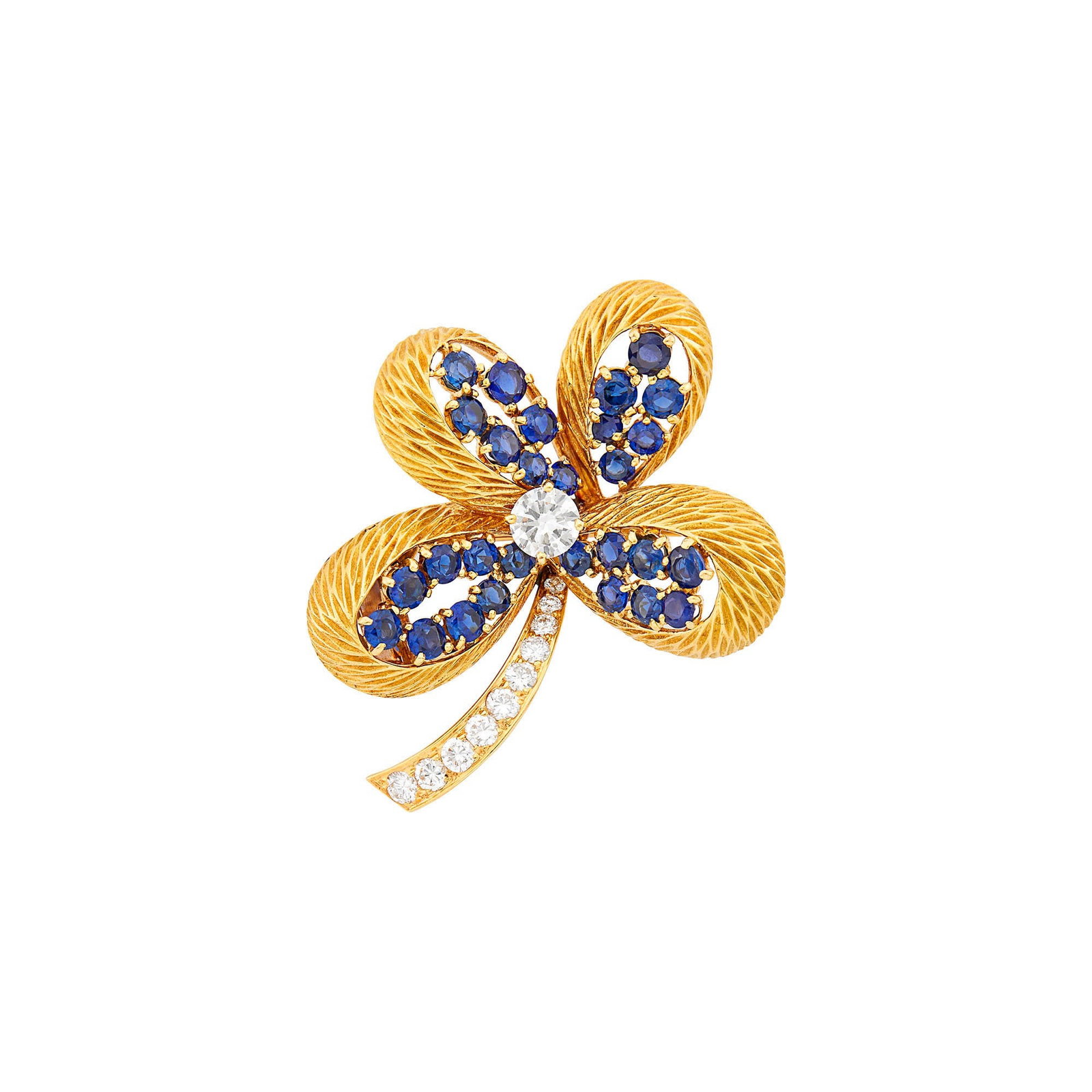 Cartier Paris Gold, Diamond and Sapphire Clip: 18 kt., one round diamond ap. .50 ct., 10 round diamonds ap. .40 ct., 28 round sapphires, signed Cartier Paris, no. 016634, with maker's mark and French assay mark, ap. 8 dwts. Center diamond: H-I-VS,